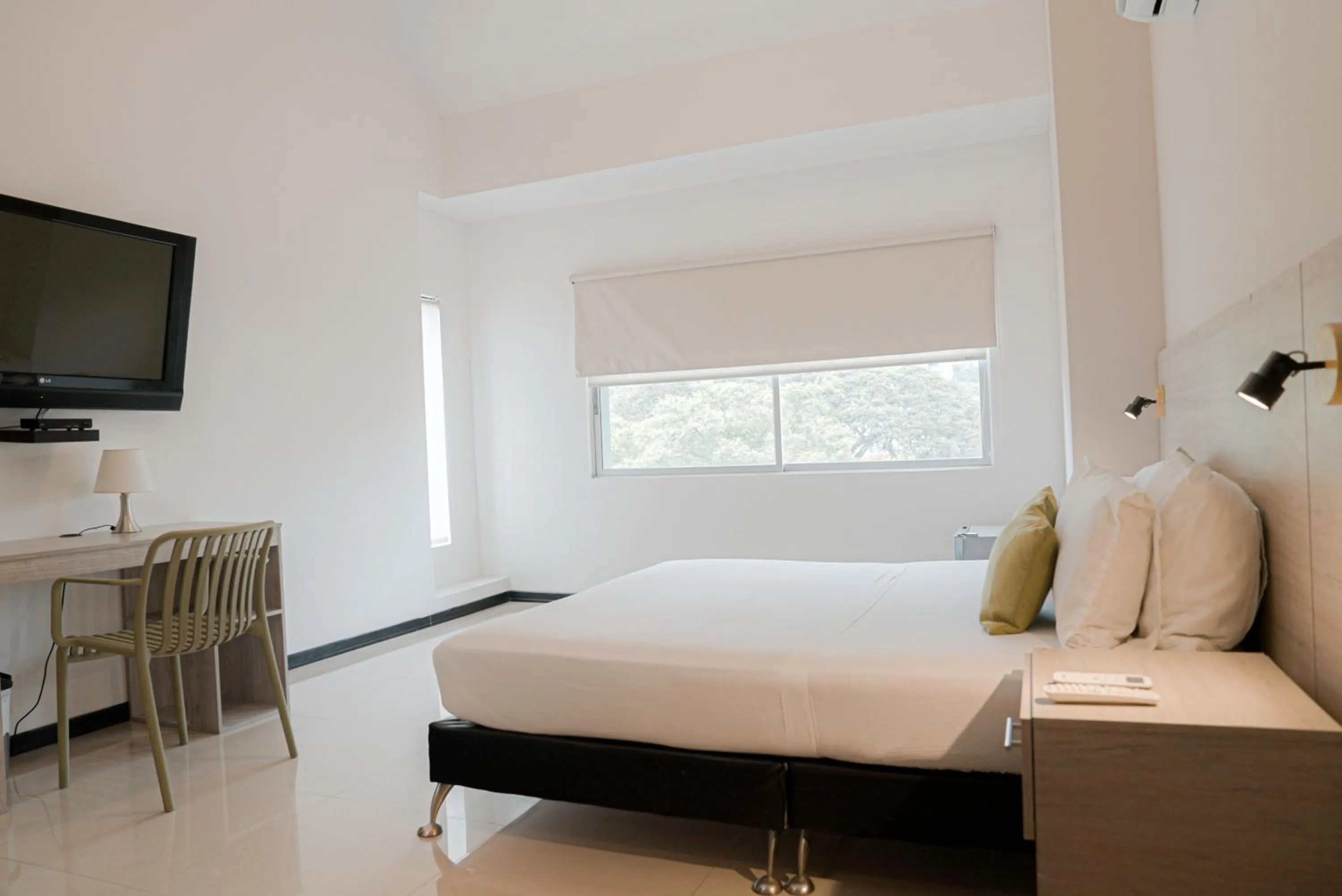 Bed in Basic Hotel Chipichape by Hoteles MS