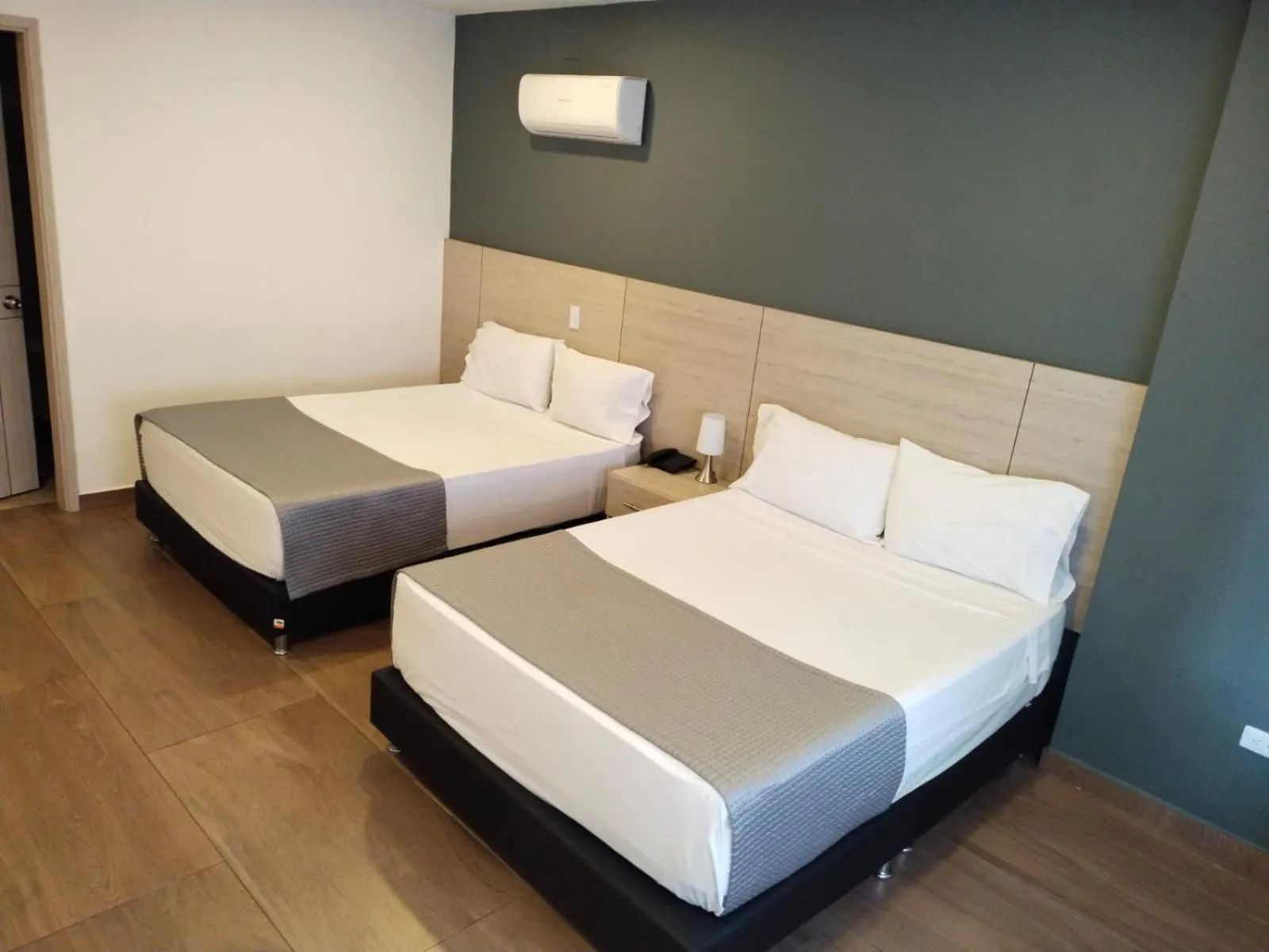 Bed in Basic Hotel Chipichape by Hoteles MS