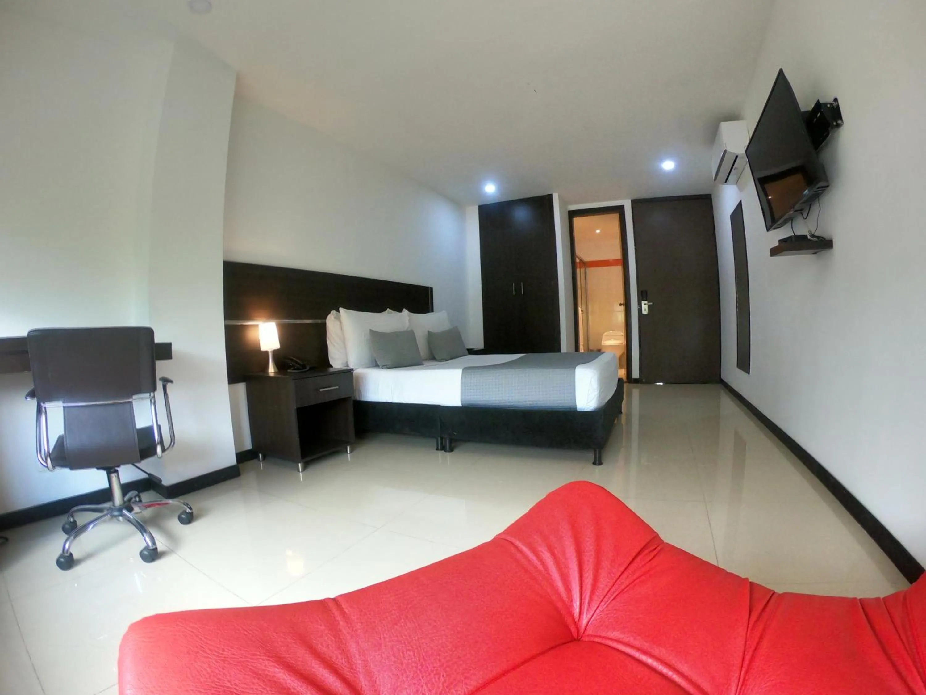 Bed in Basic Hotel Chipichape by Hoteles MS