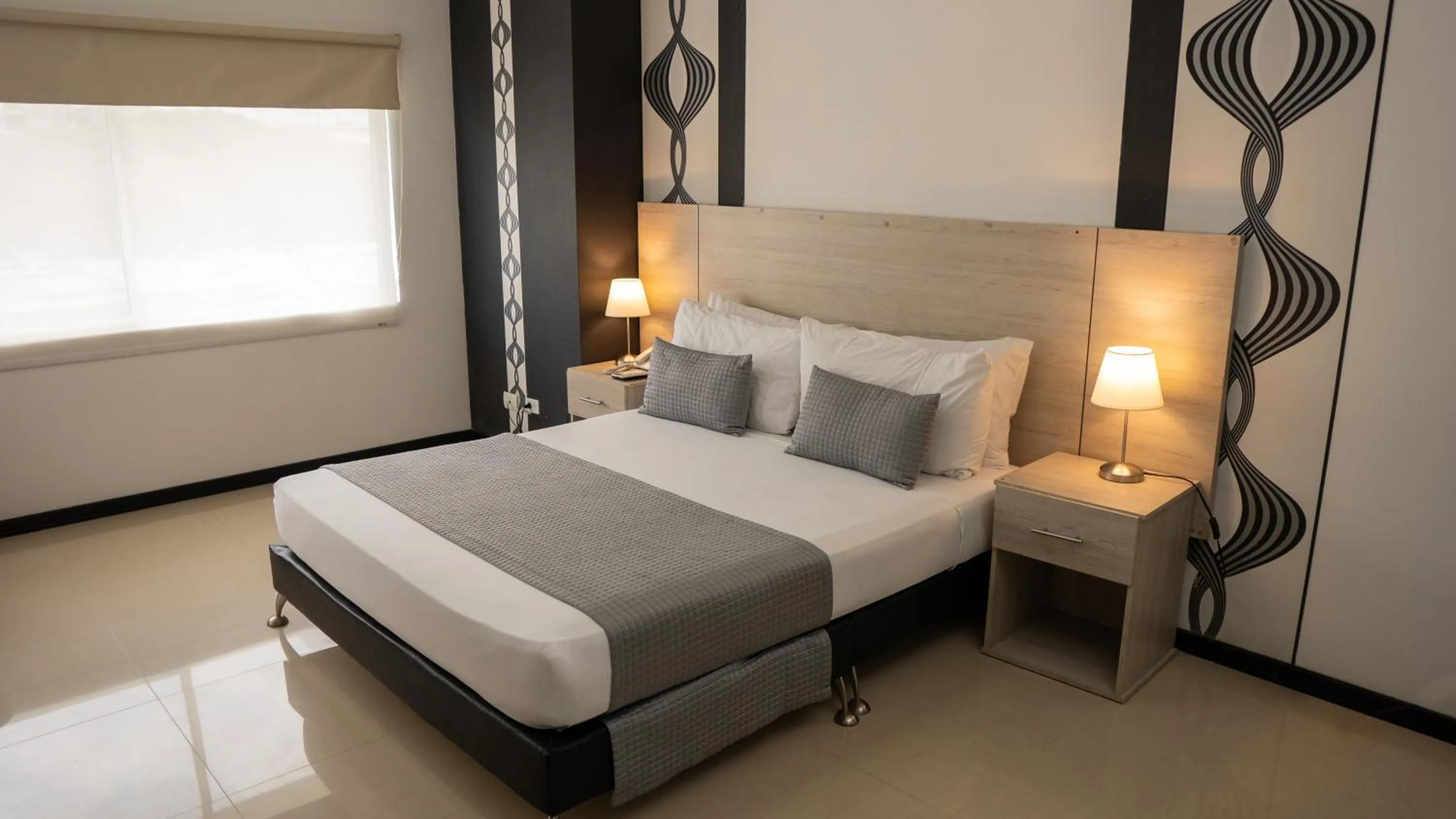 Bed in Basic Hotel Chipichape by Hoteles MS