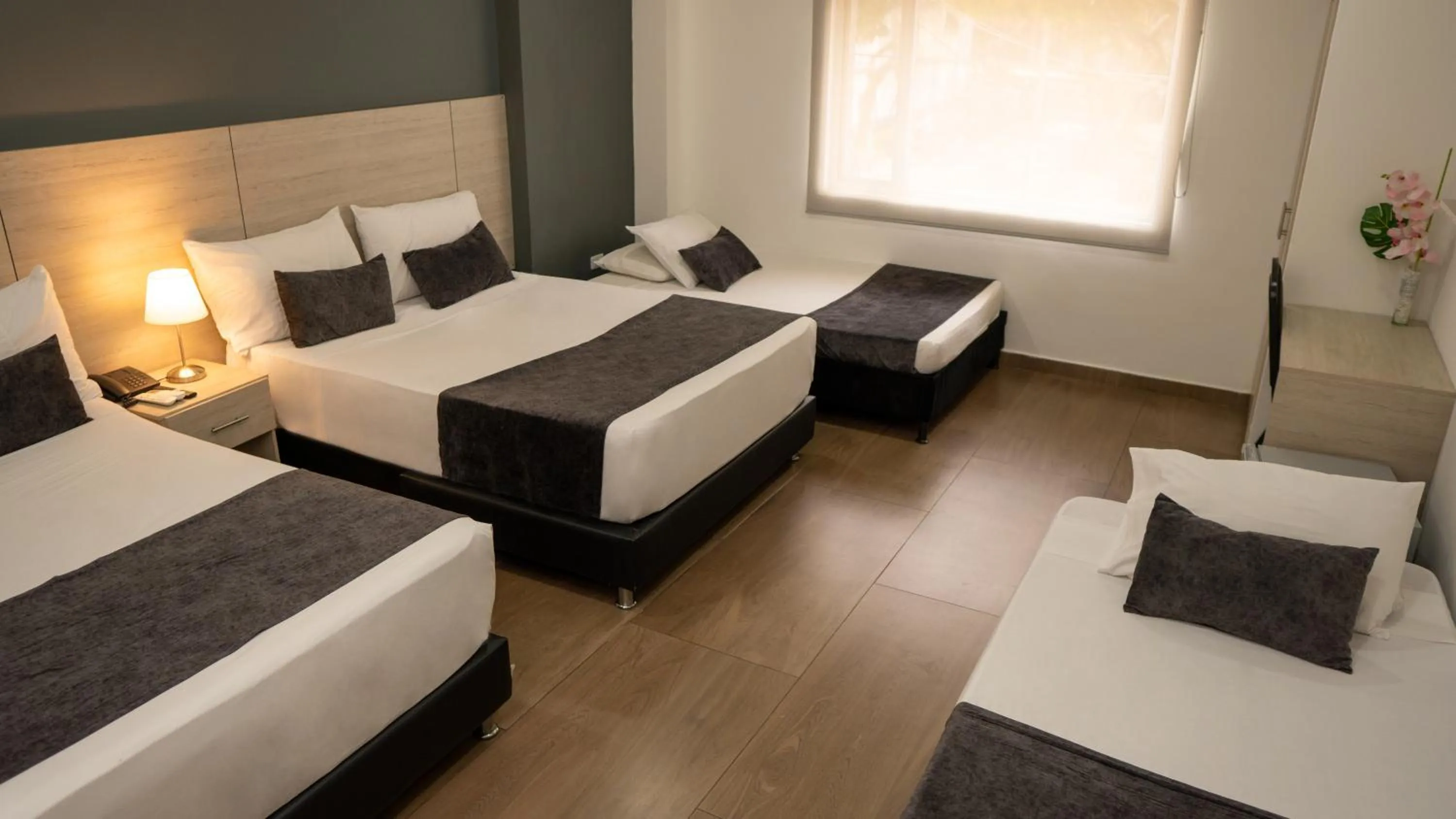 Bed in Basic Hotel Chipichape by Hoteles MS