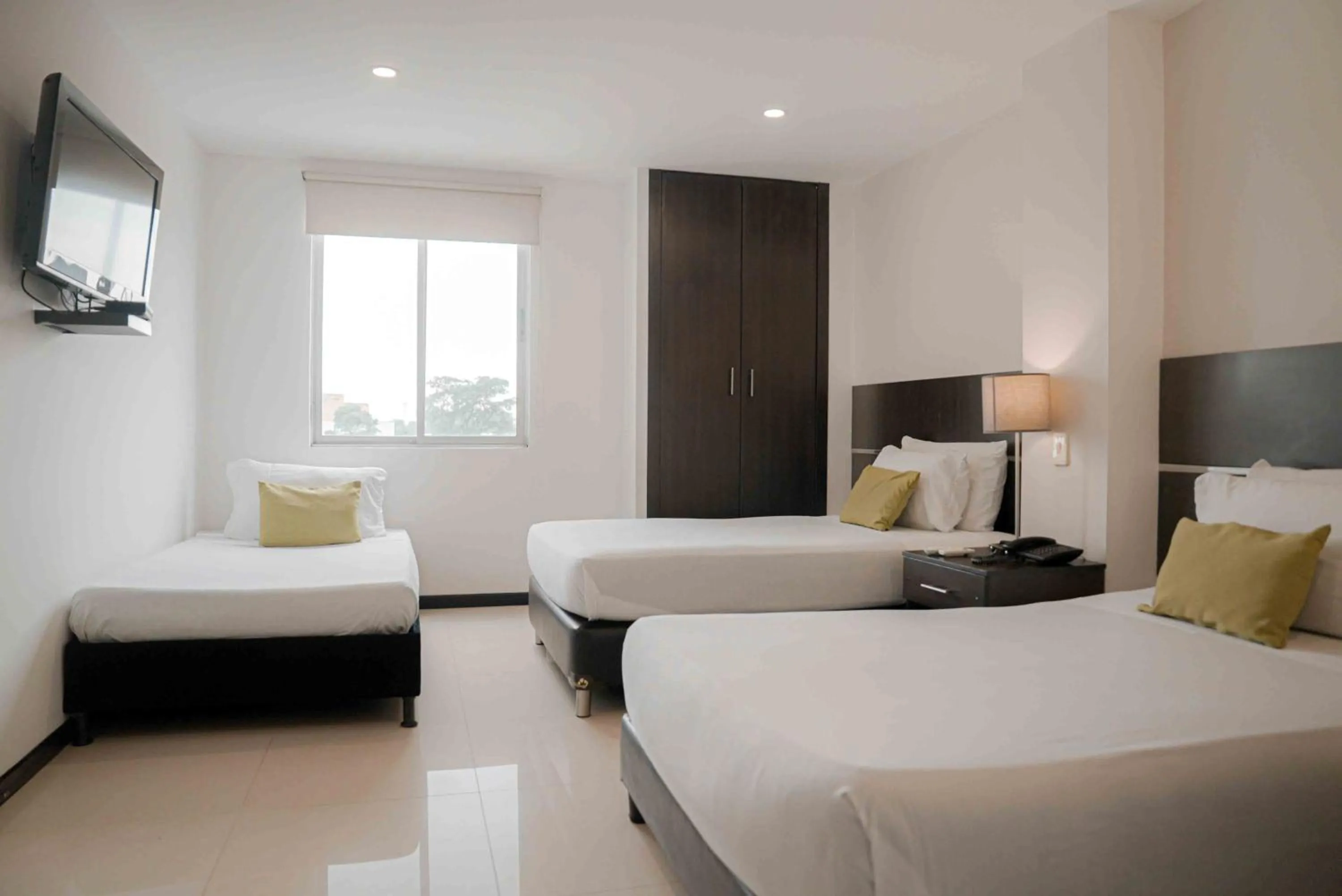 Bed in Basic Hotel Chipichape by Hoteles MS