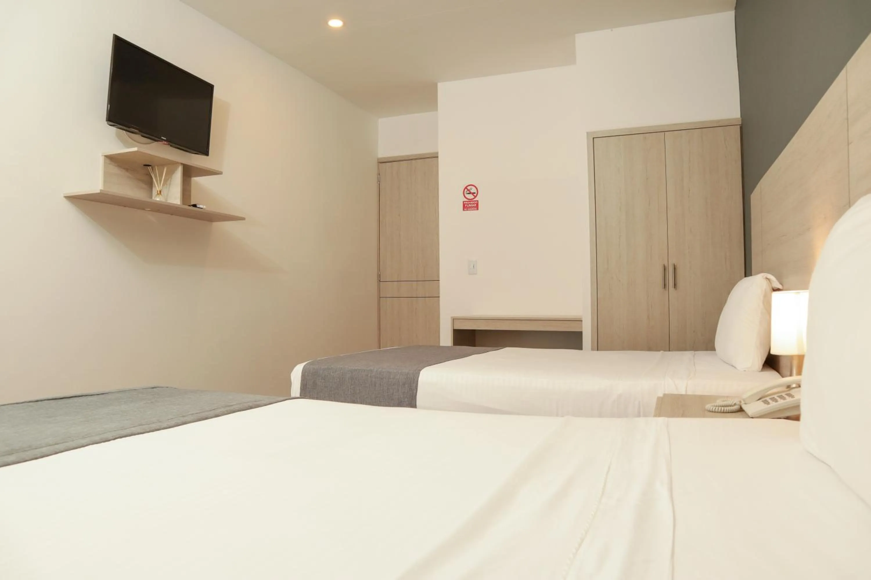 Bed in Basic Hotel Chipichape by Hoteles MS