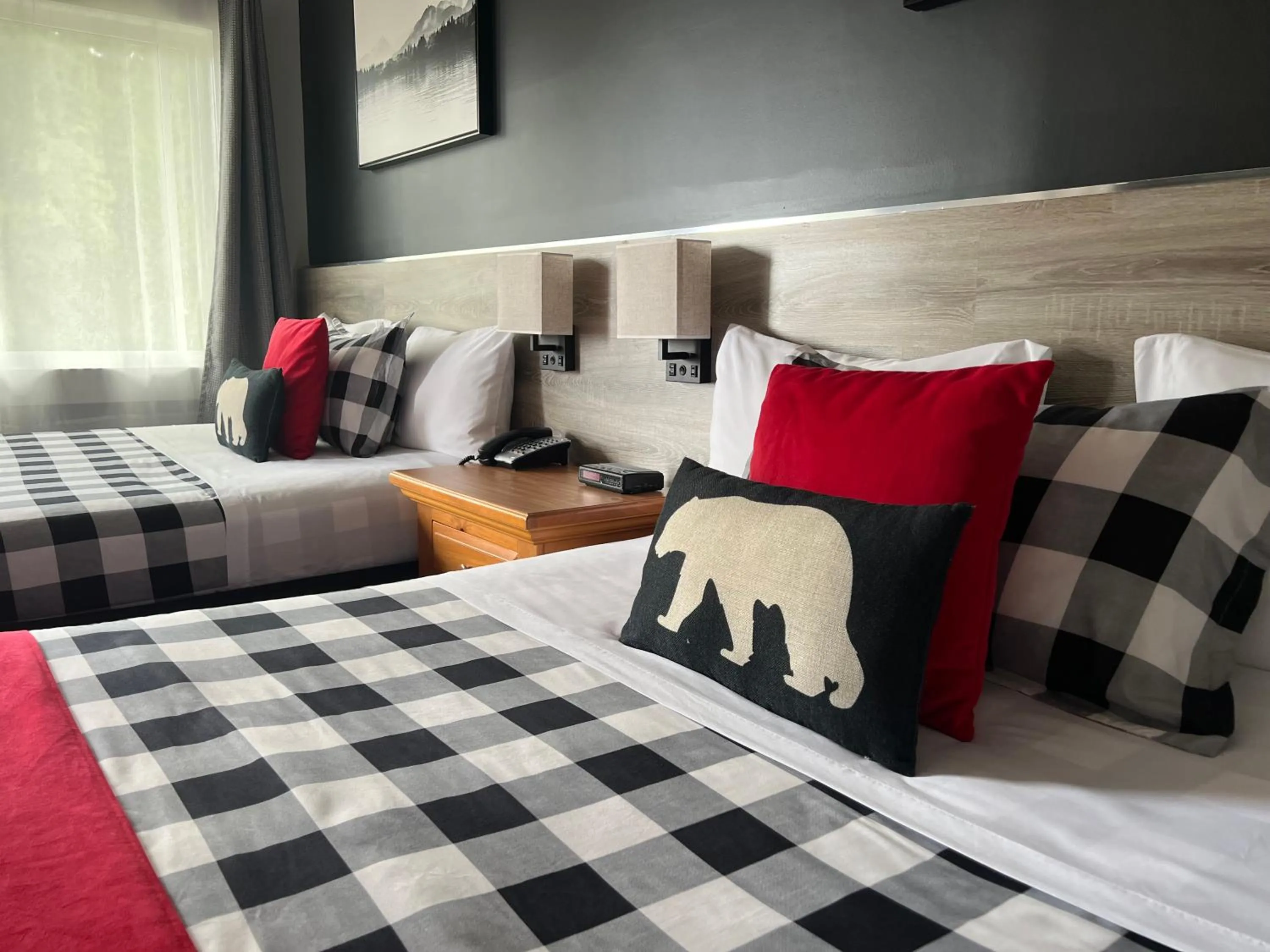 Bed in Mystic Isle Motel