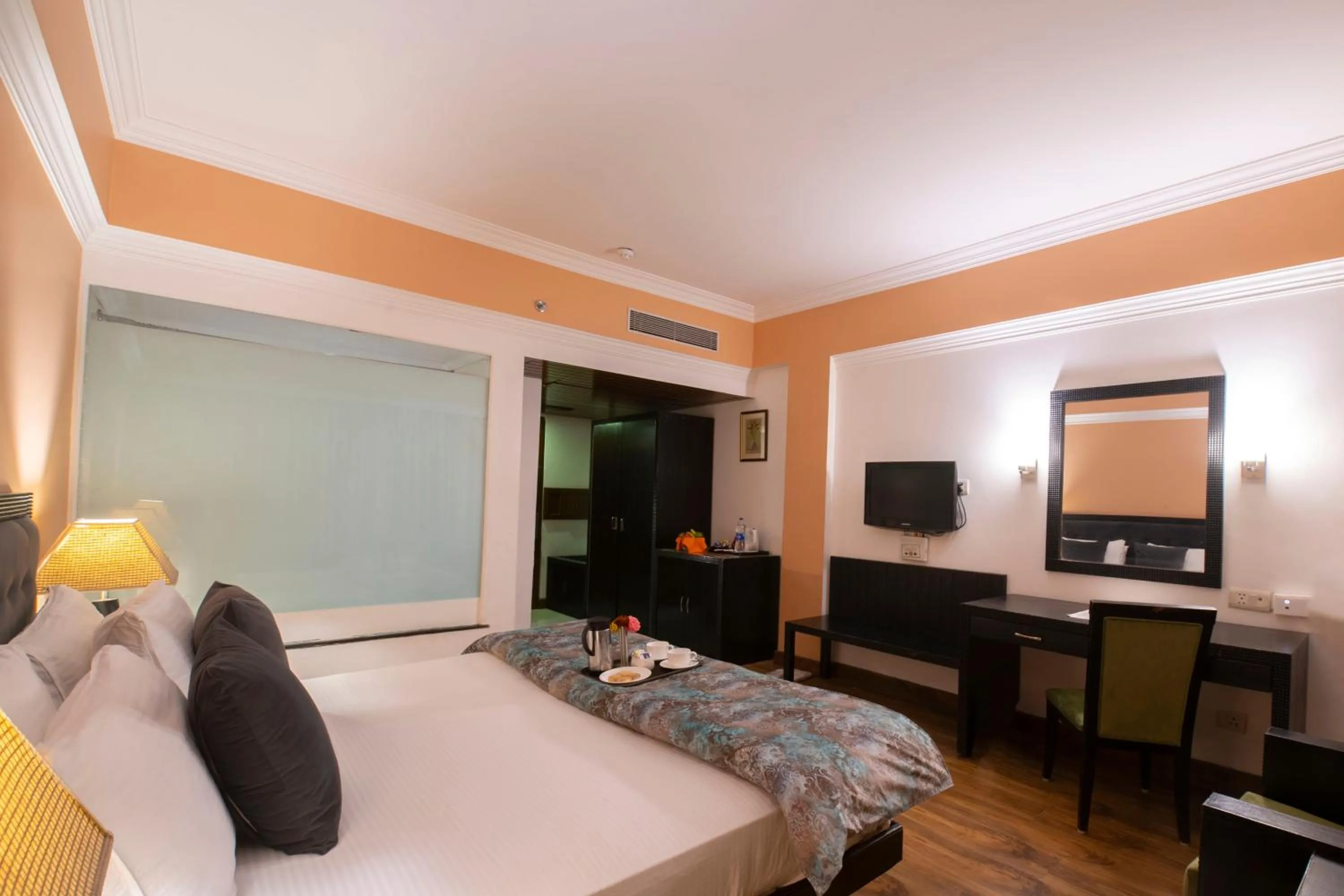 Bed in Mastiff Grand Manali Resort