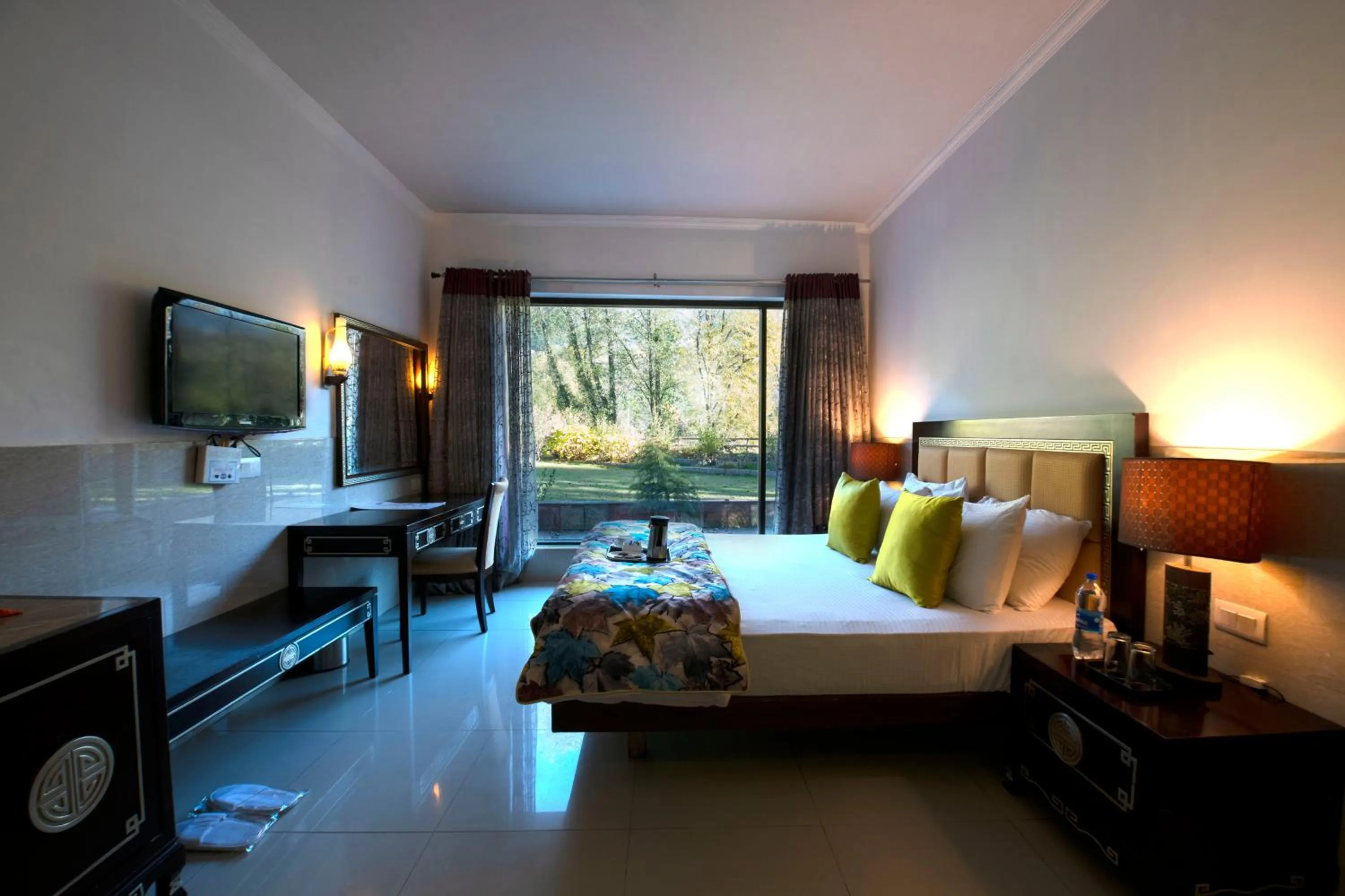 Bed in Mastiff Grand Manali Resort