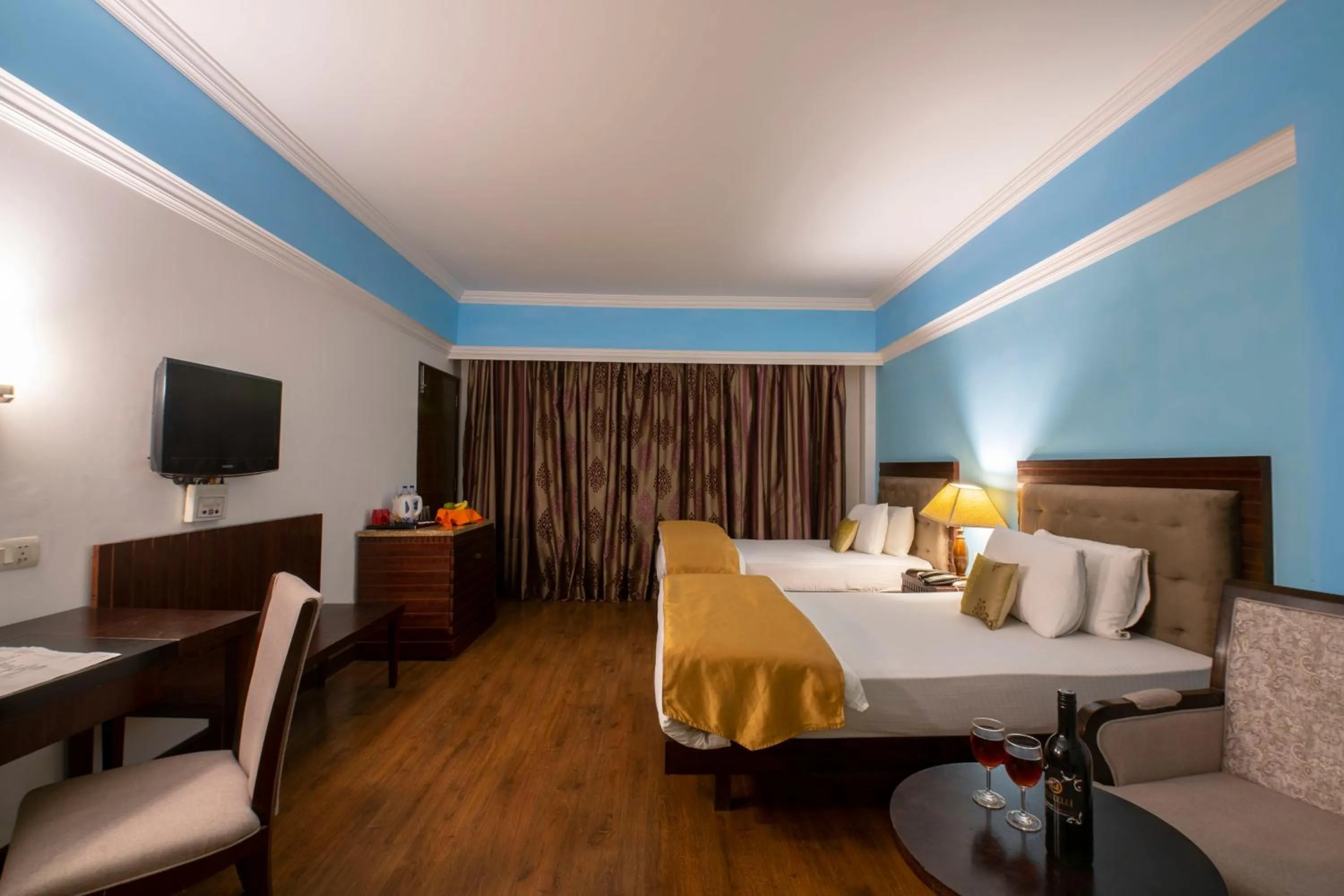 Bed in Mastiff Grand Manali Resort