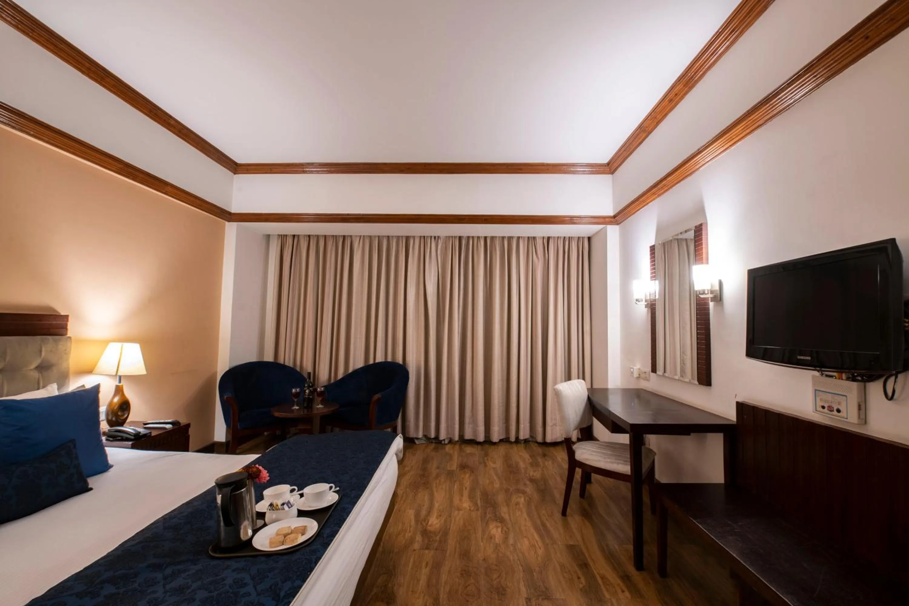 Bed in Mastiff Grand Manali Resort