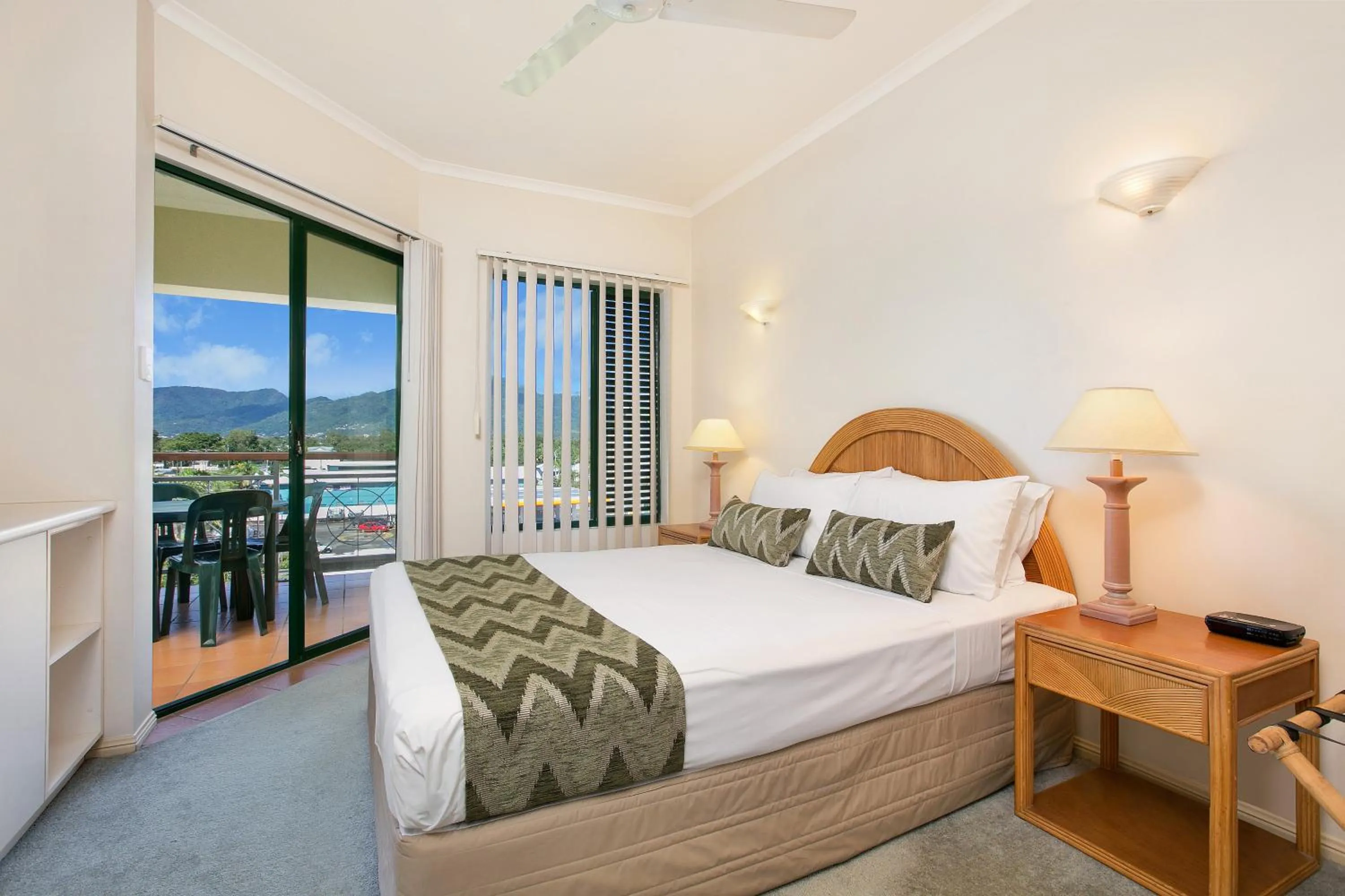 Bed in Tropic Towers Apartments