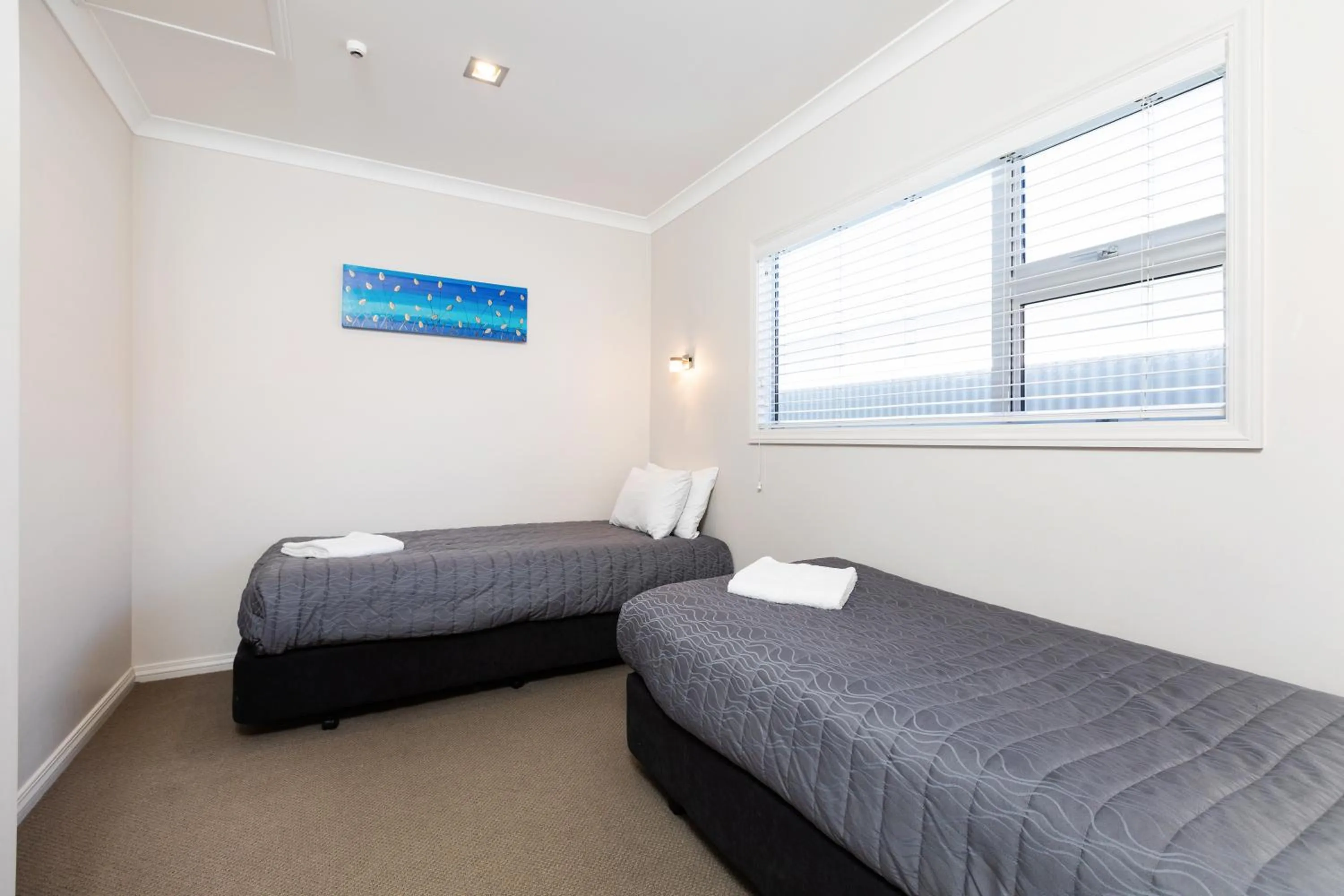 Bed in Beach Street Motel Apartments