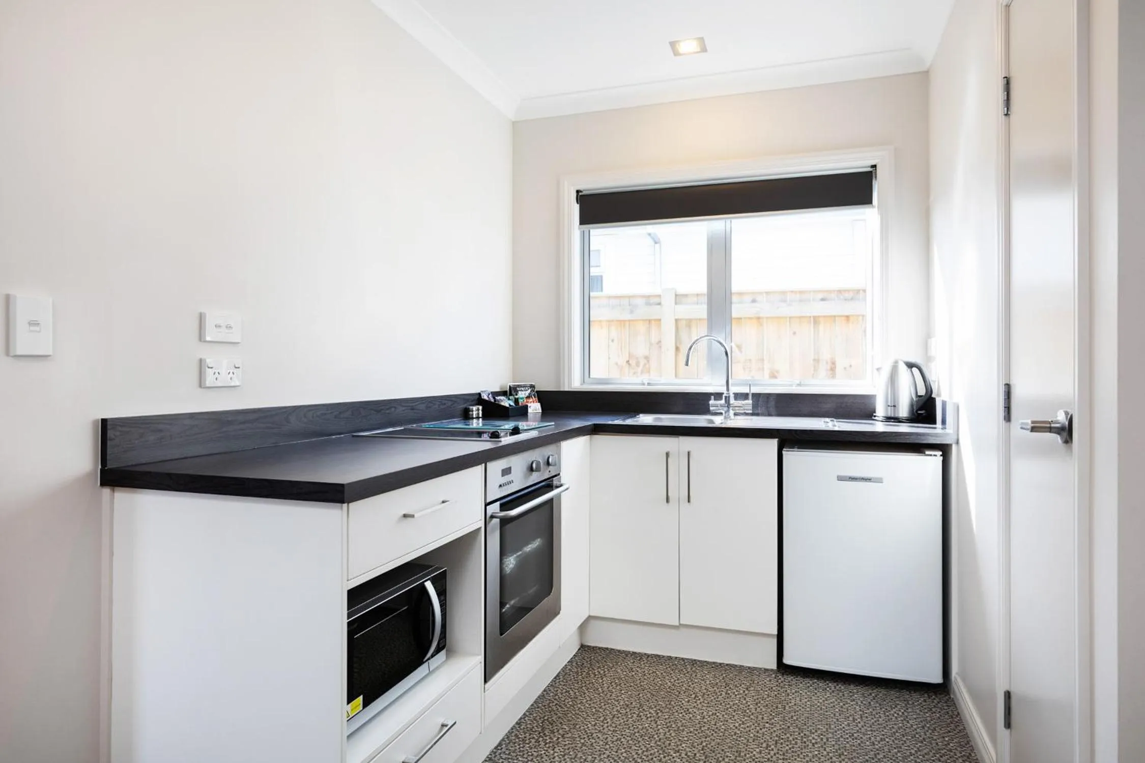 Kitchen or kitchenette in Beach Street Motel Apartments