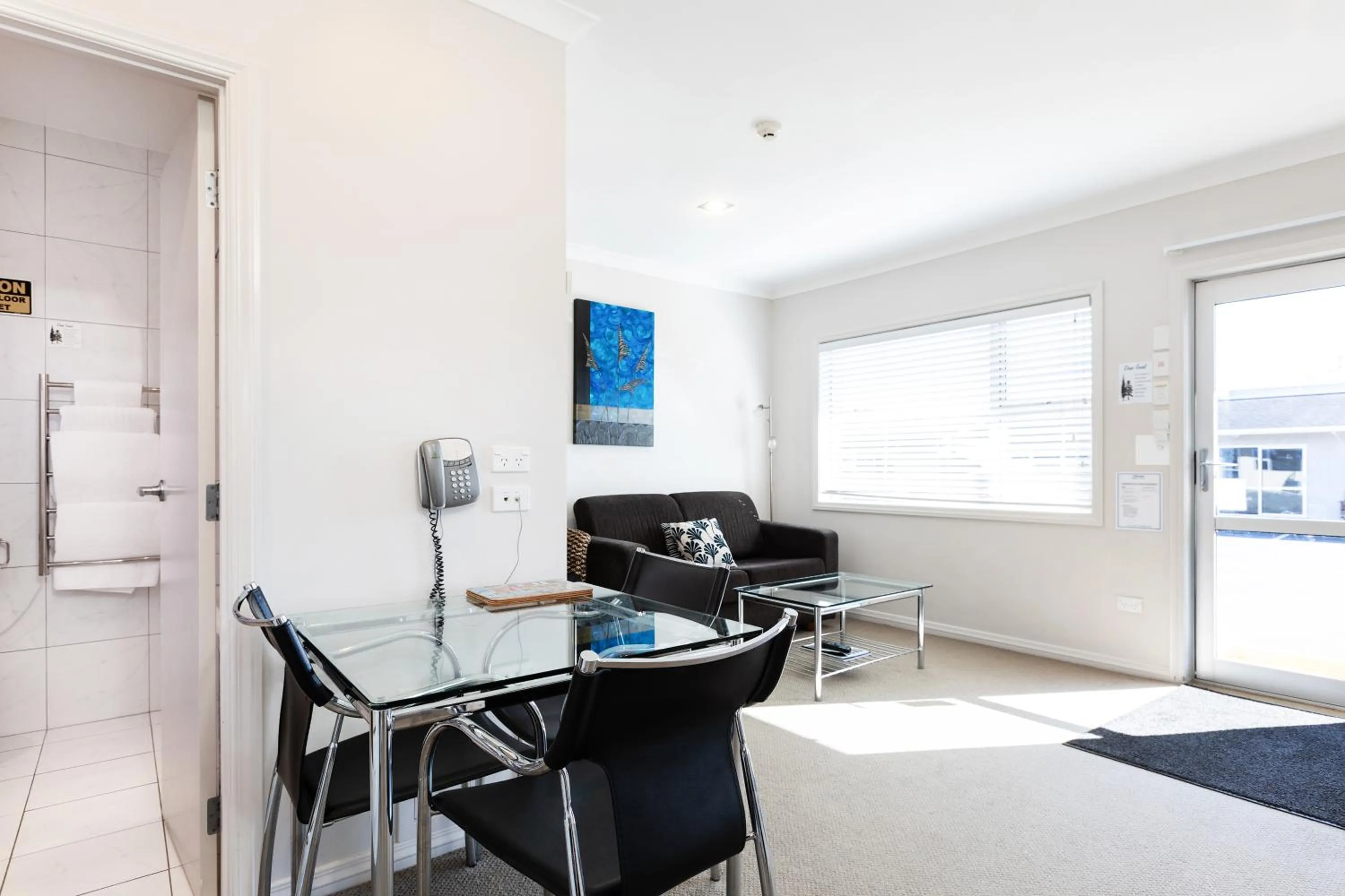 Living room in Beach Street Motel Apartments