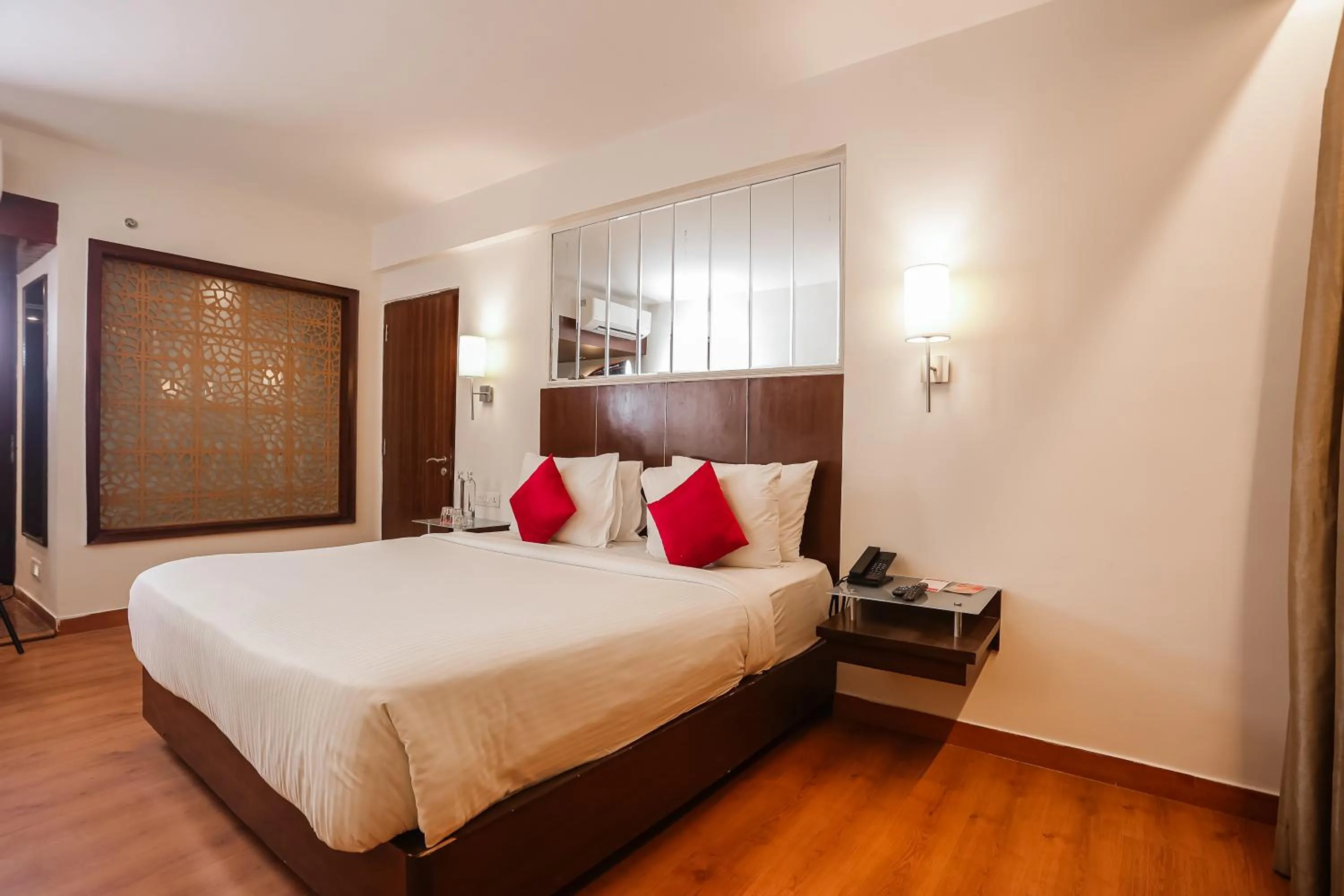 Bed in Ramada by Wyndham Jaipur North