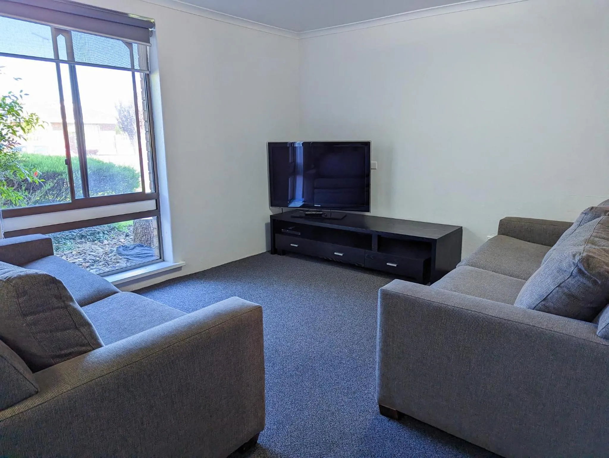Living room in Arkana Motor Inn & Terrace Apartments