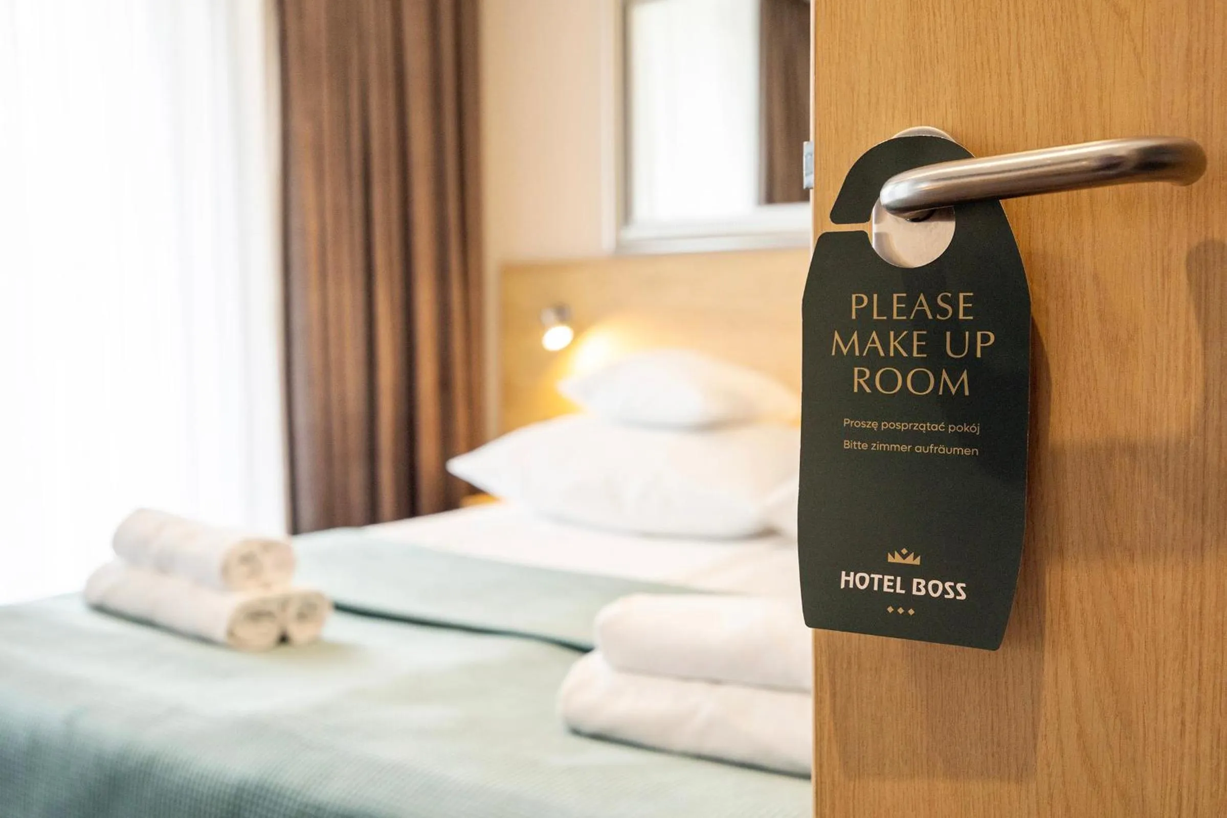 Property logo or sign, Bed in Hotel Boss