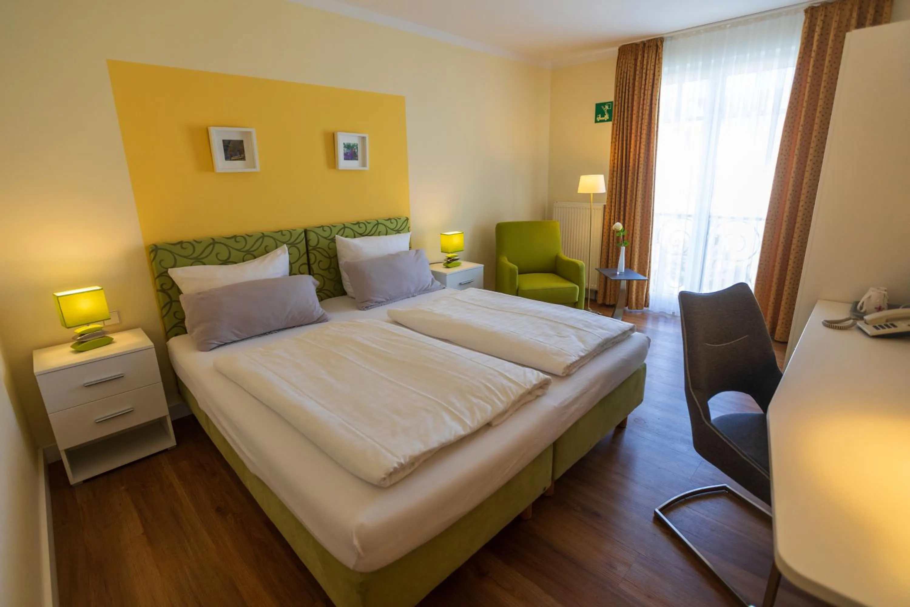 Photo of the whole room, Bed in Landhotel Gillenfelder Hof