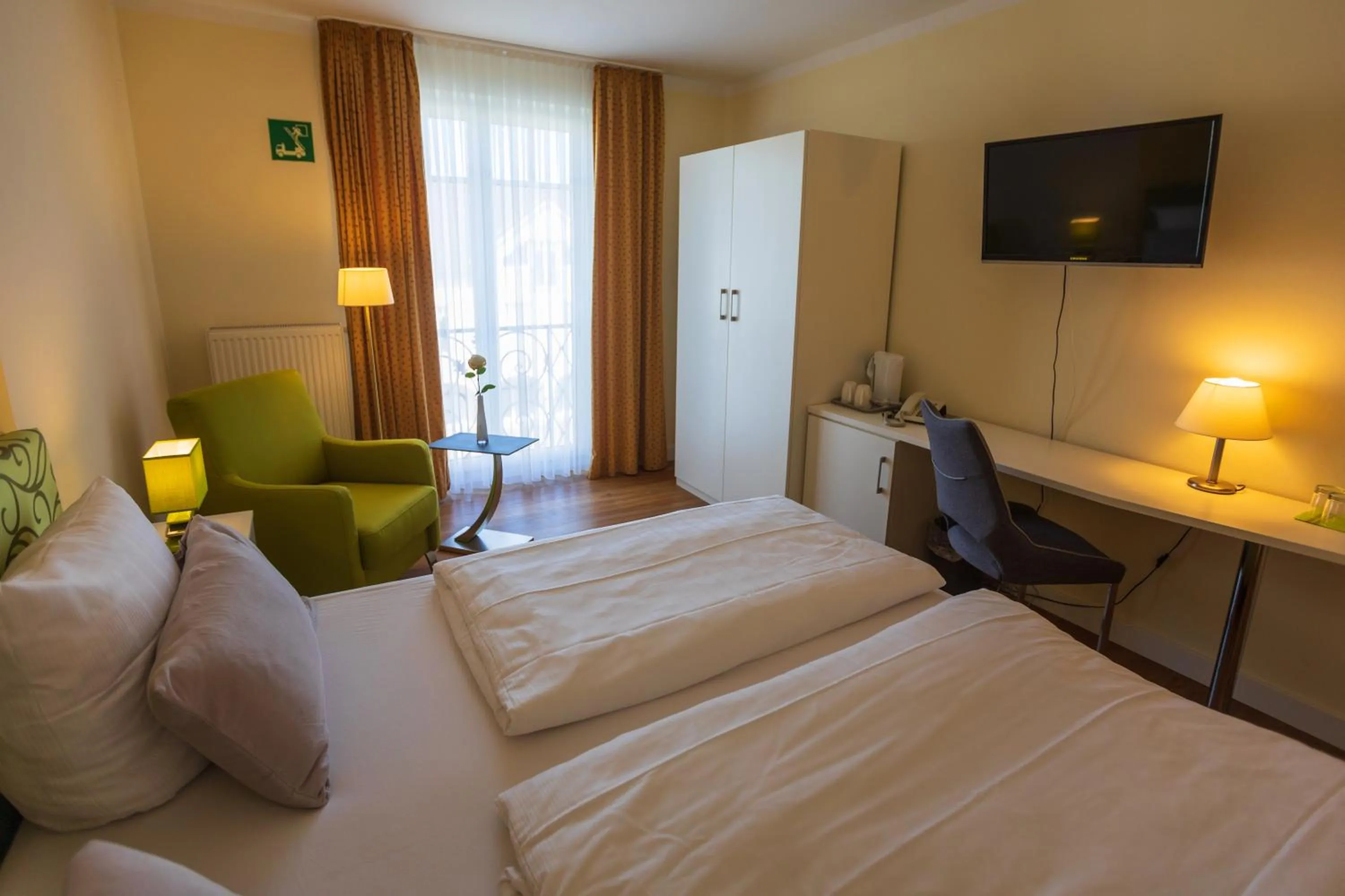 Photo of the whole room, Bed in Landhotel Gillenfelder Hof