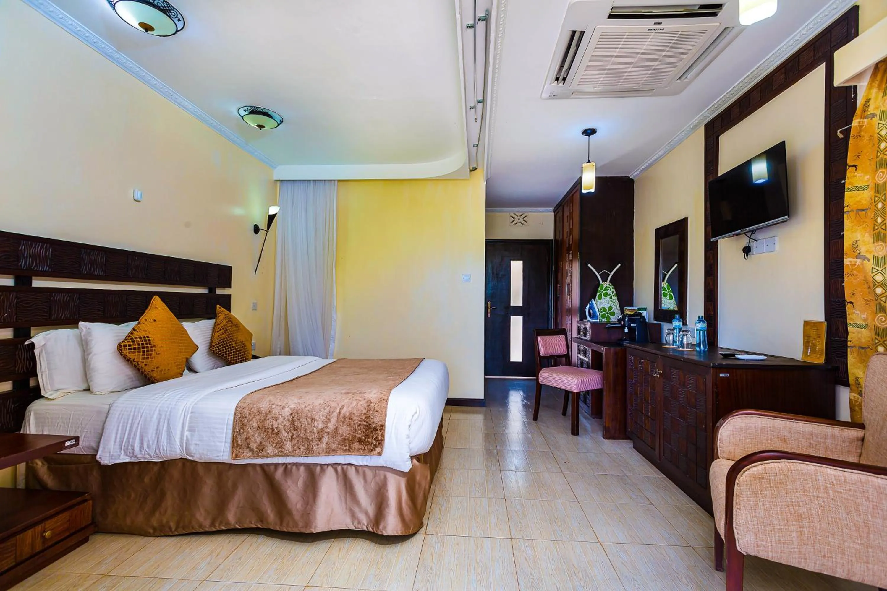 Communal lounge/ TV room, Bed in Lake Bogoria Spa Resort