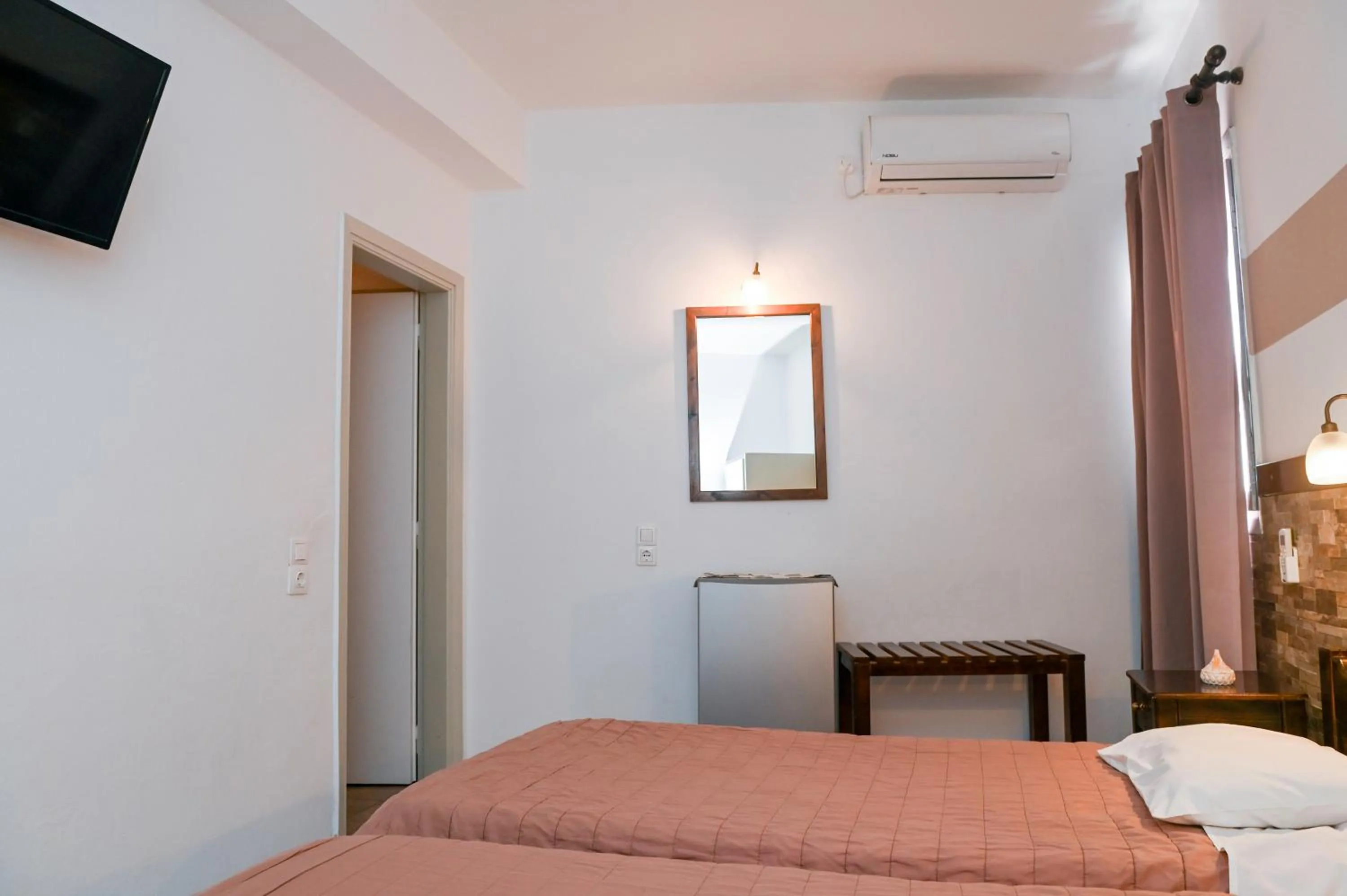 Bed in Narkissos Hotel