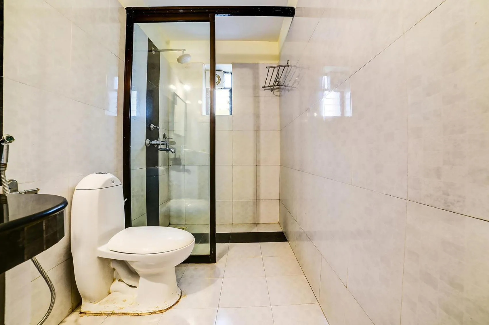 Bathroom in Nitya Resort, Calangute