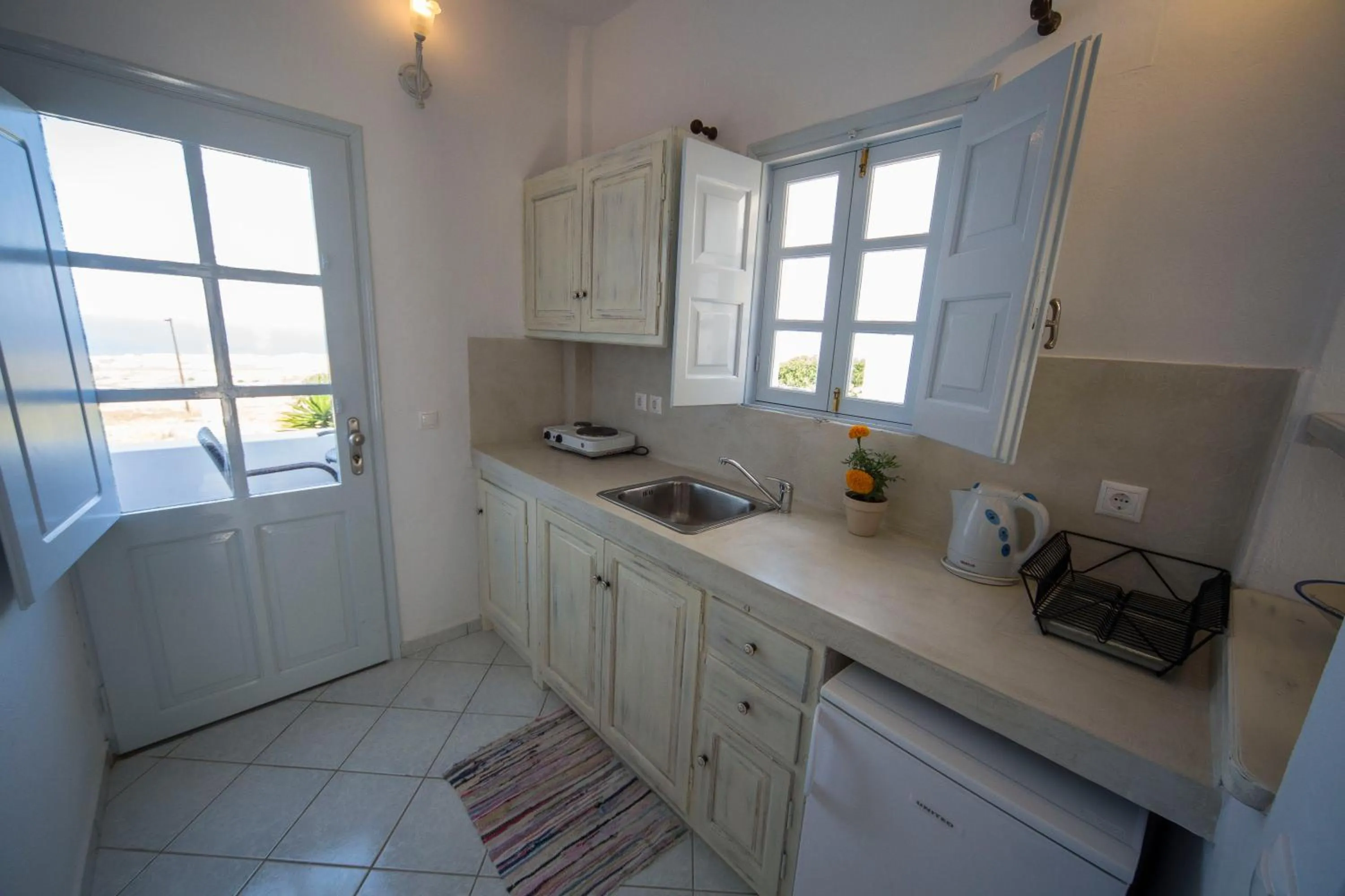 Kitchen or kitchenette in Ianthe Apartments & Villa