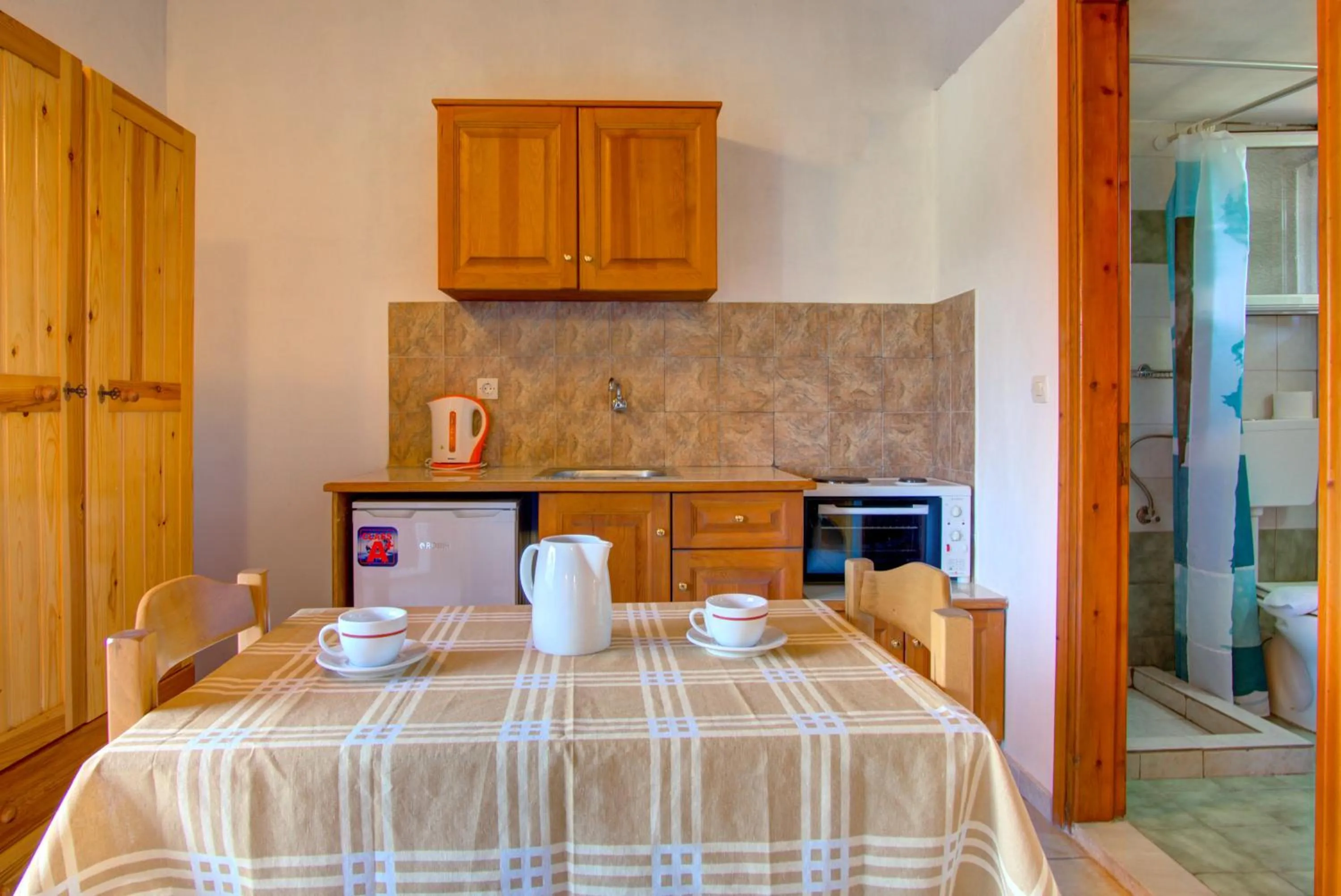 kitchen, Bed in Blue Dream Apartments
