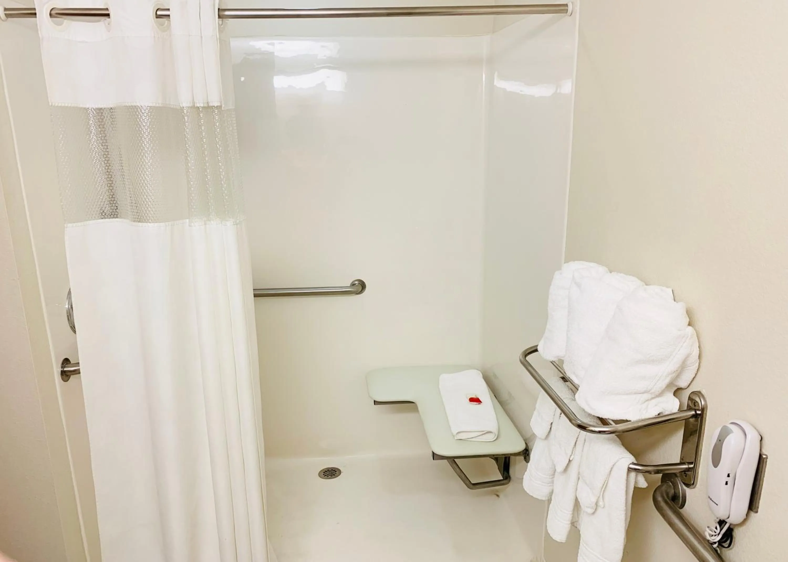 Bathroom in Ramada Limited by Wyndham, Bloomington I-55 & I-74 IL