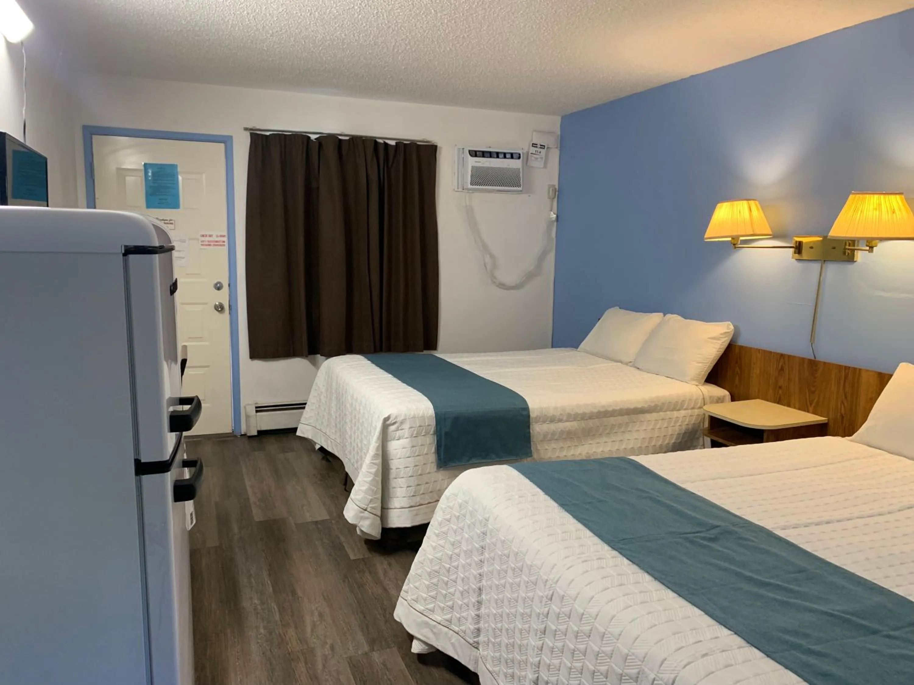 Bed in Swiss Sunset Inn