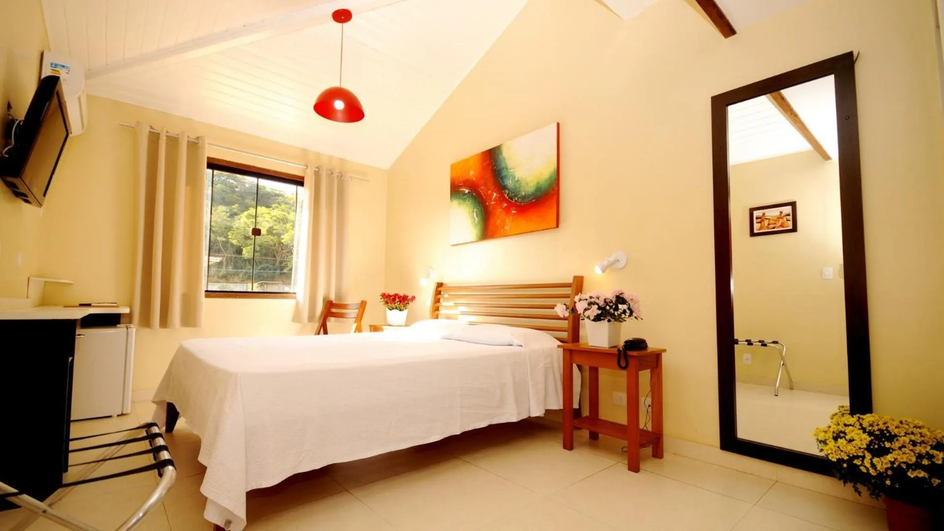 Bed in Pousada El Parador