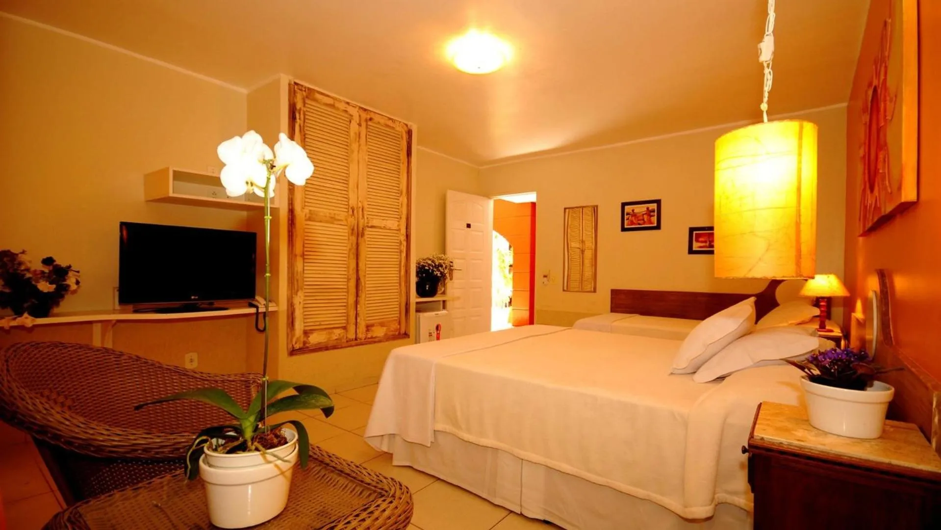 Bed in Pousada El Parador