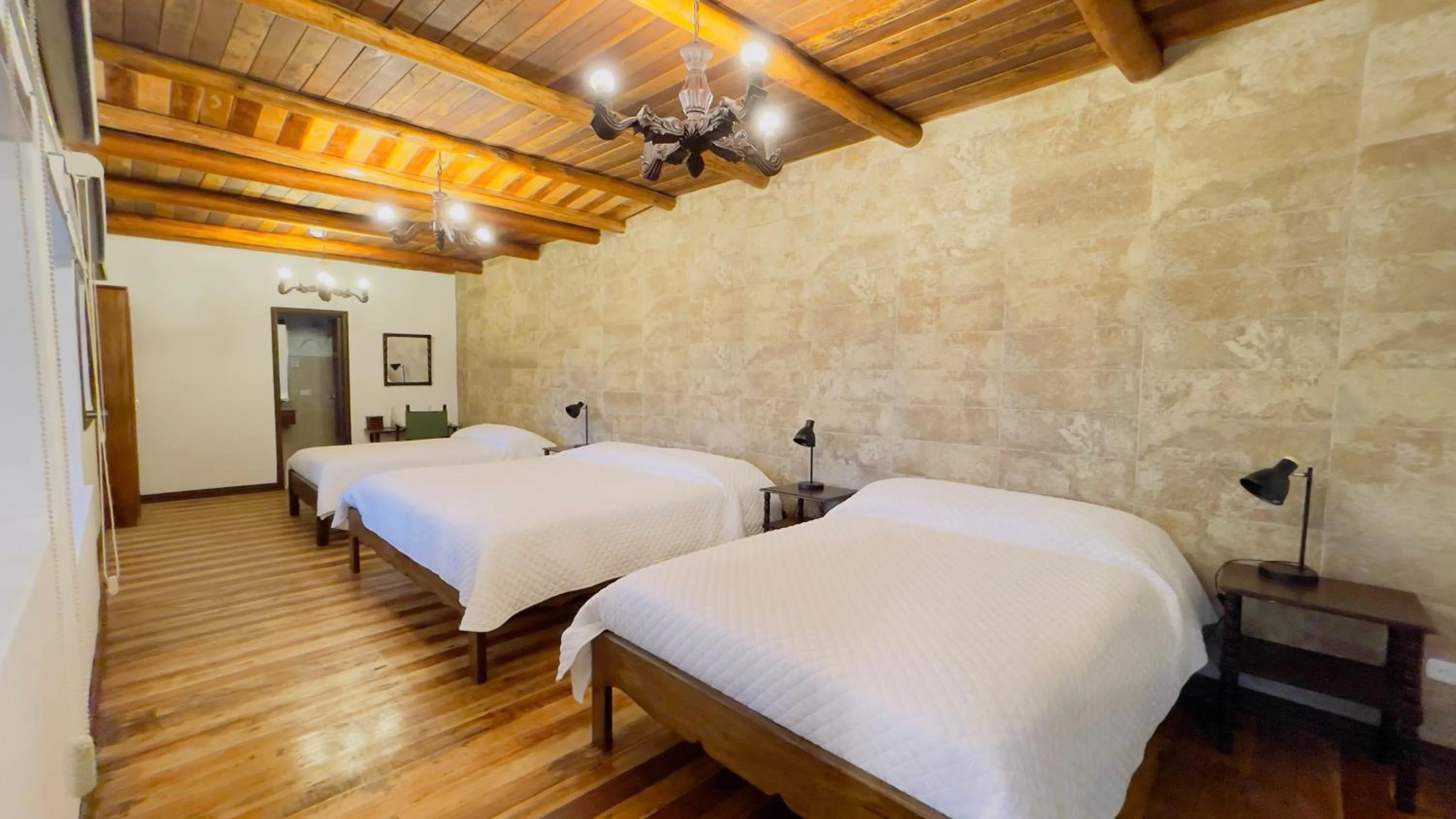 Bed in Hacienda Hosteria Chorlavi