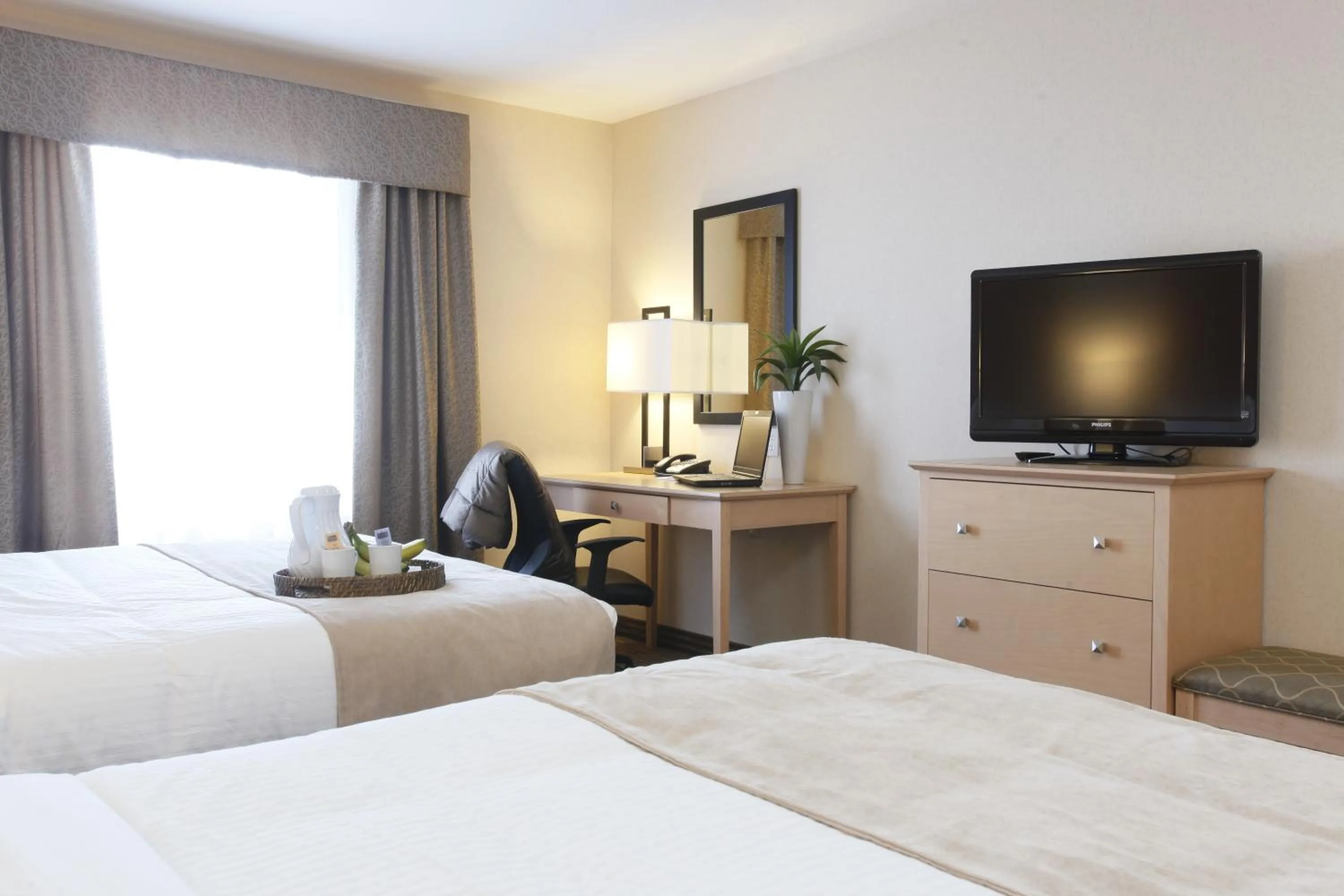 Decorative detail, Bed in Vegreville Suites