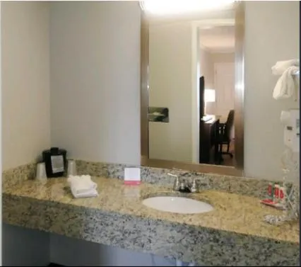 Bathroom in Travelodge by Wyndham Canton-Livonia Area, MI