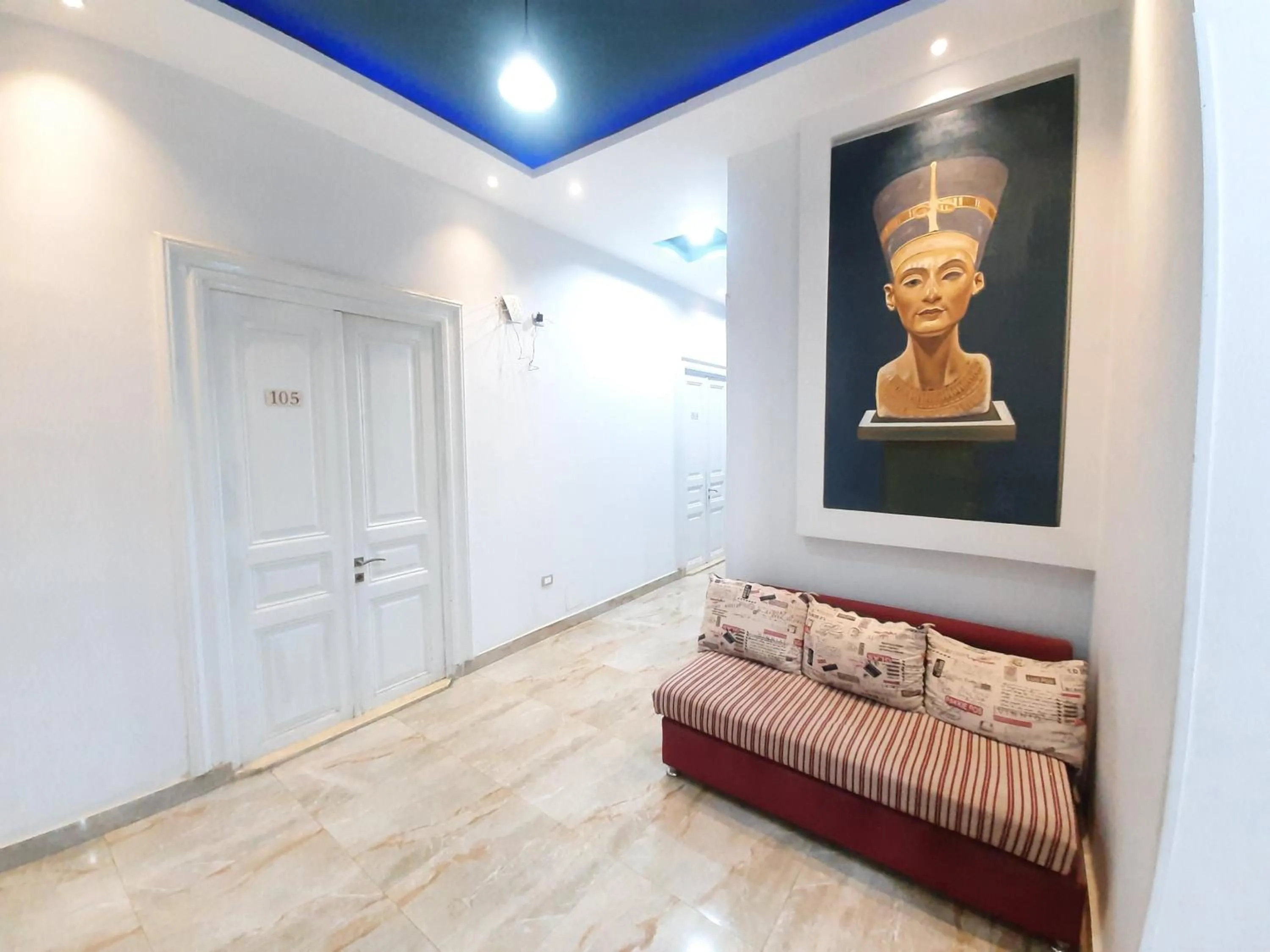 Communal lounge/ TV room in Hostgram Hotel