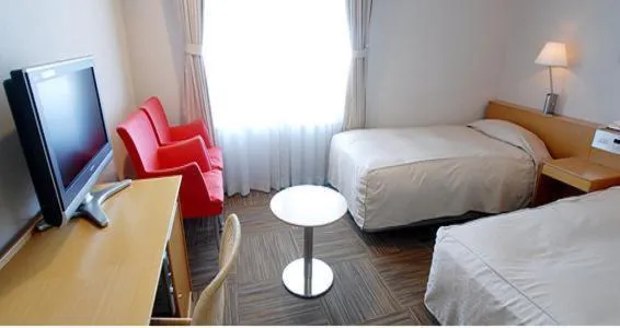 Bed in Hotel Landmark Wakayama