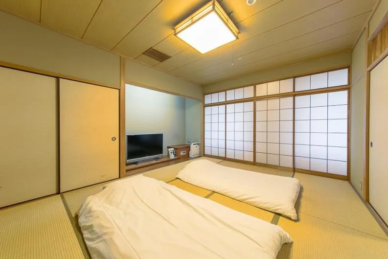 Bed in Hotel Landmark Wakayama