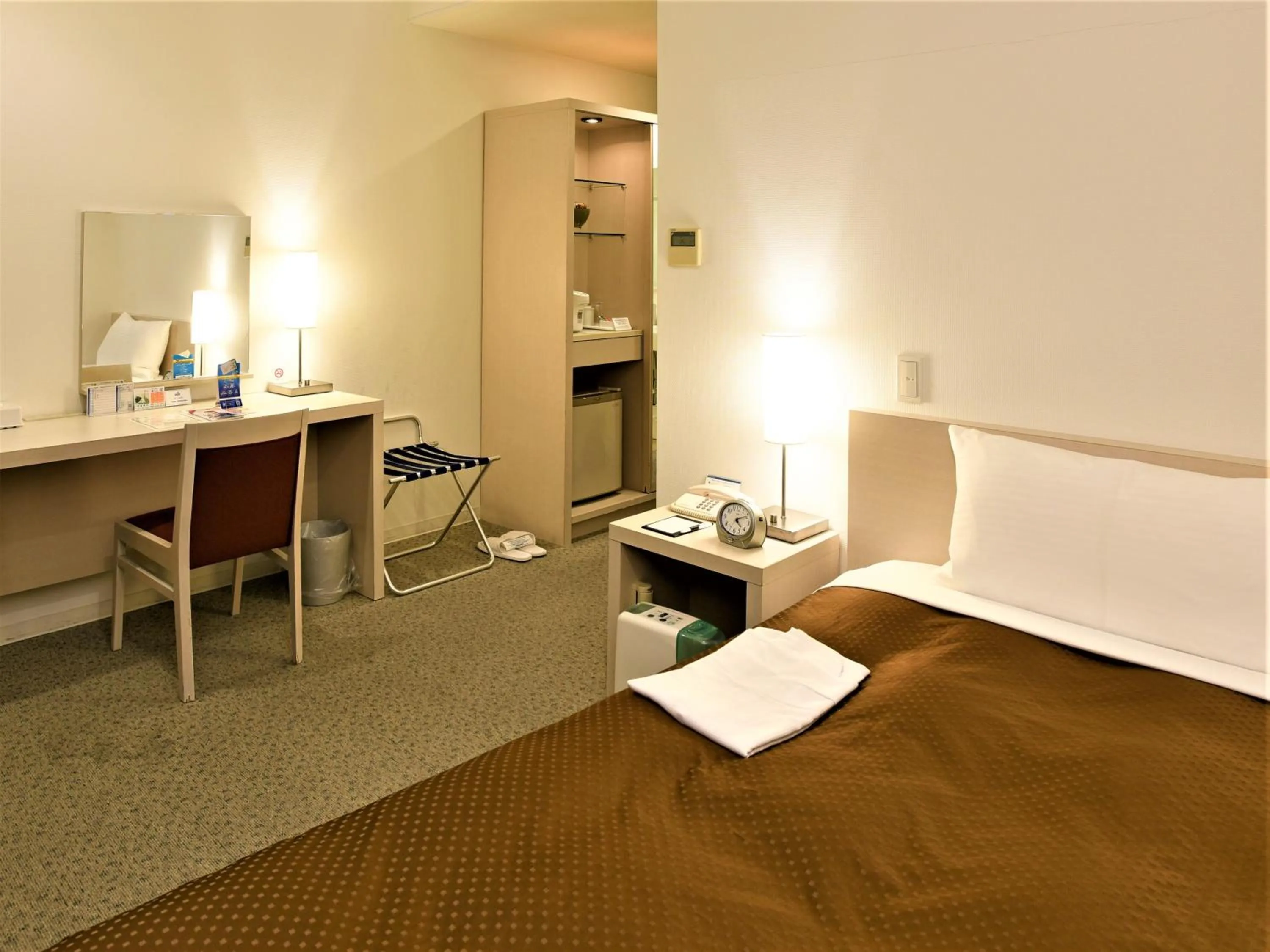 Bed in J Hotel Rinku