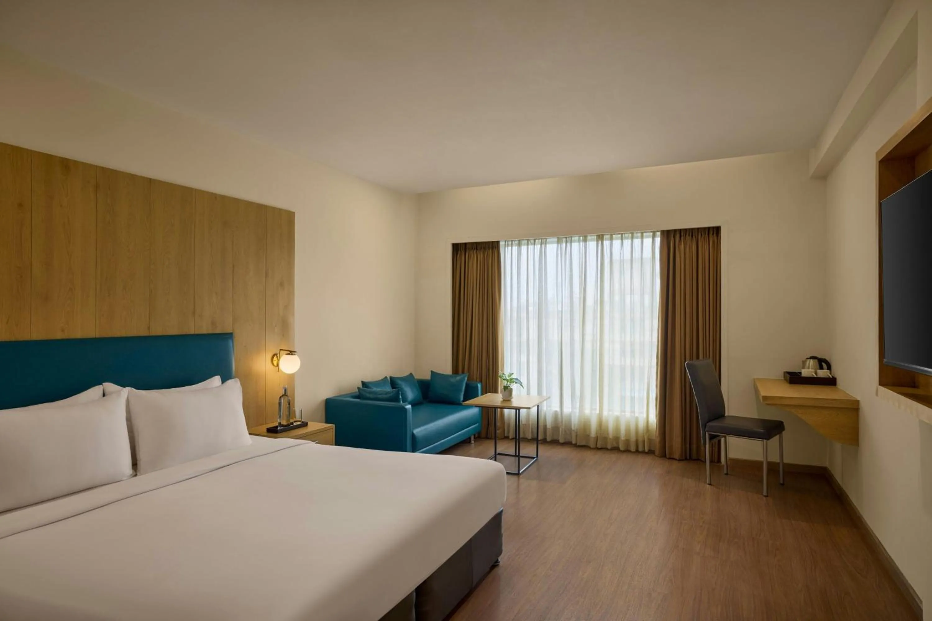 Photo of the whole room, Bed in The Fern Residency Ahmedabad, Subhash Bridge, Series by Marriott