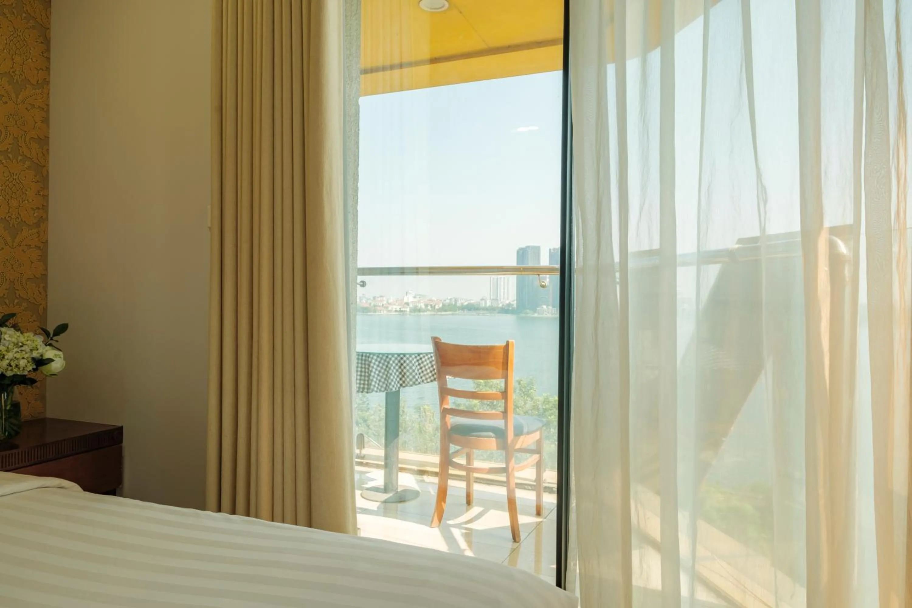 Bed in Sunset Westlake Hanoi Hotel