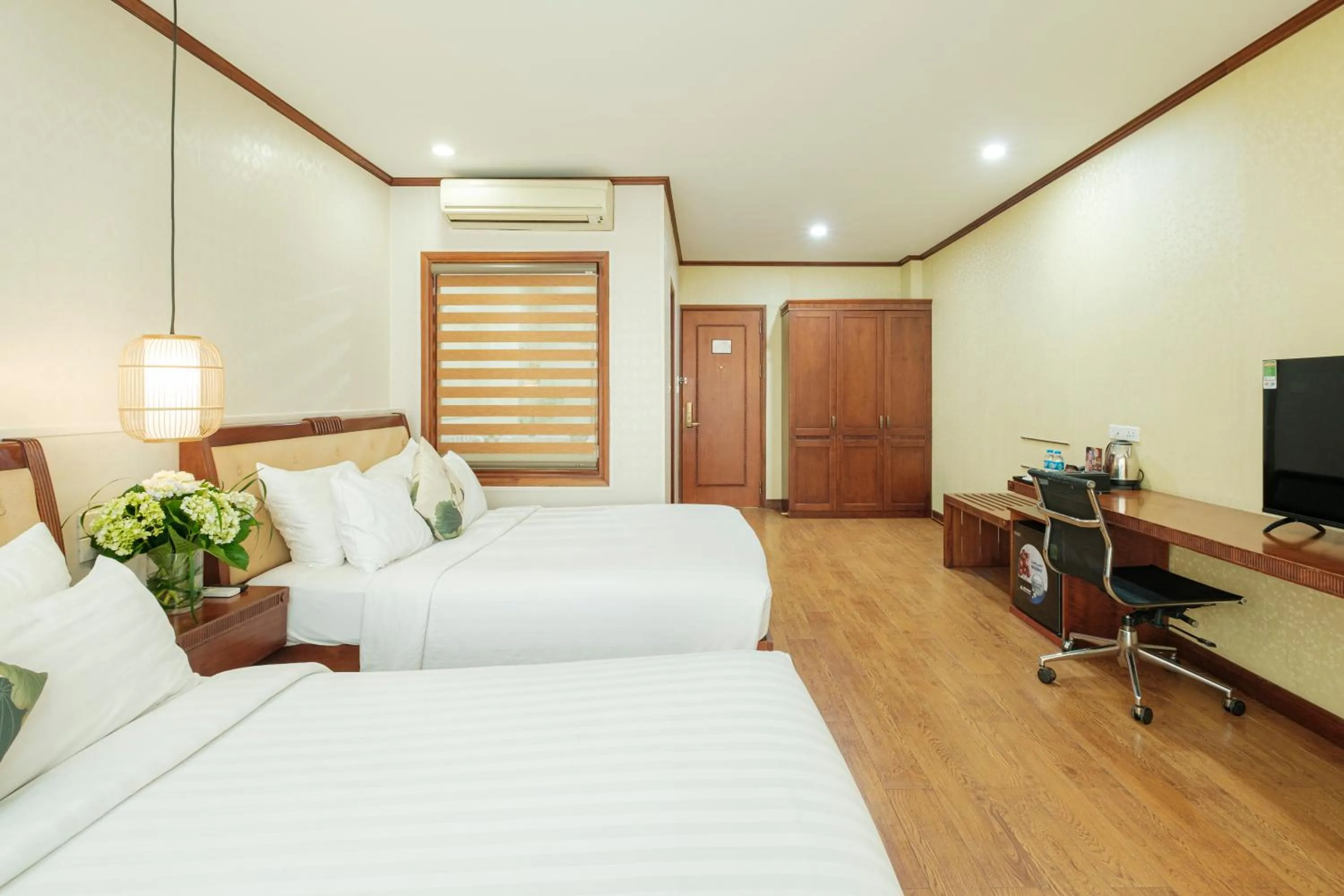 Bed in Sunset Westlake Hanoi Hotel