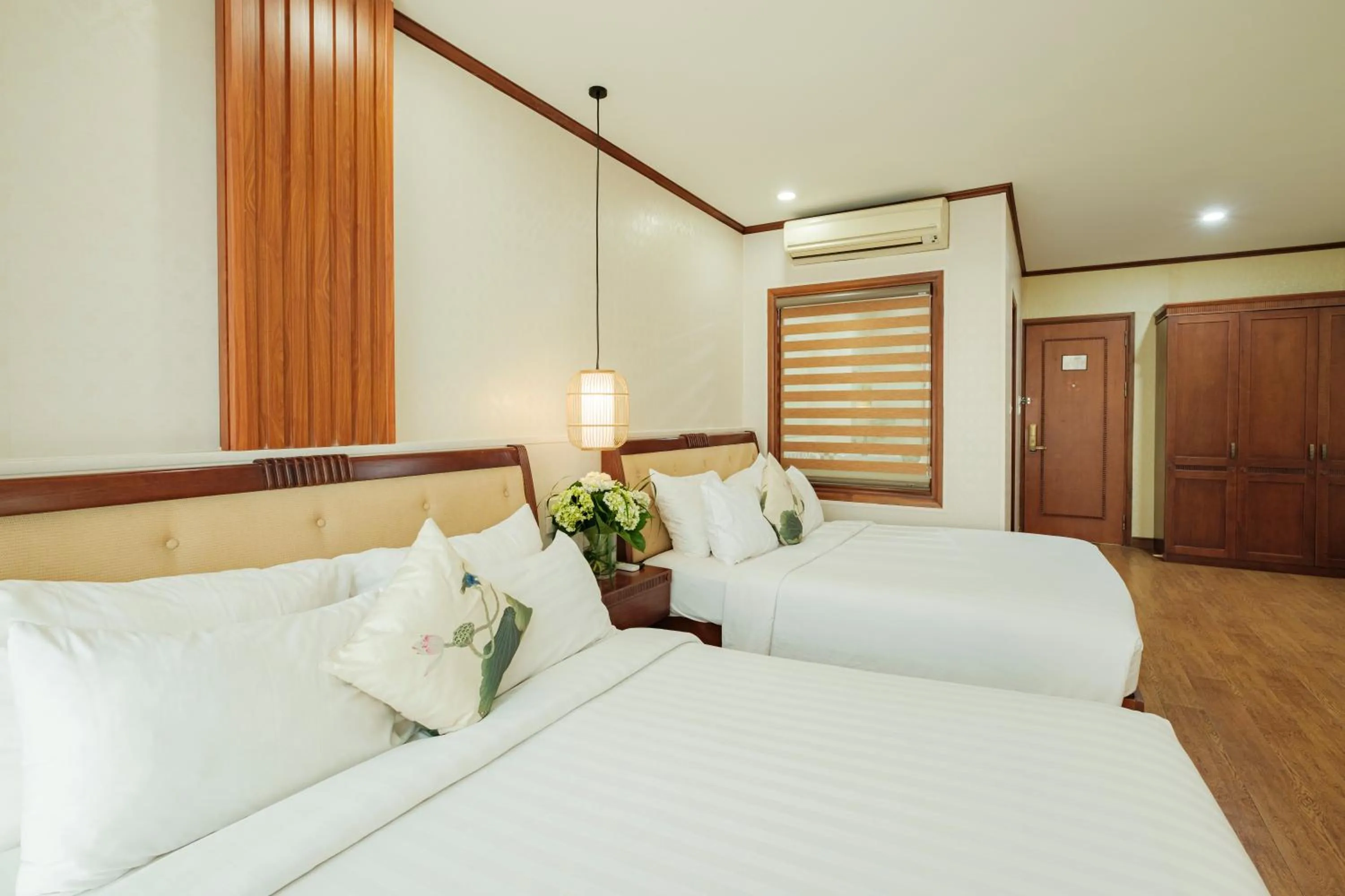 Bed in Sunset Westlake Hanoi Hotel