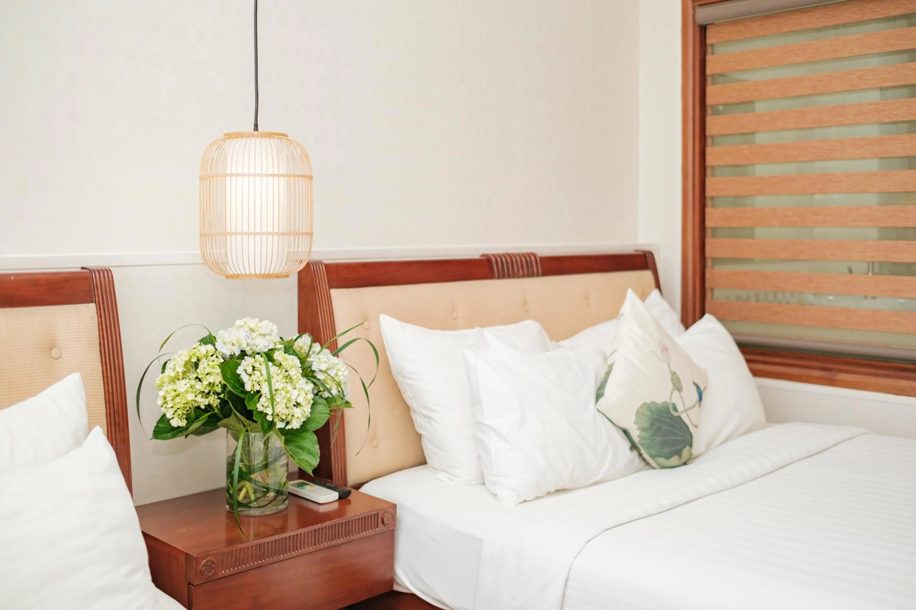 Bed in Sunset Westlake Hanoi Hotel