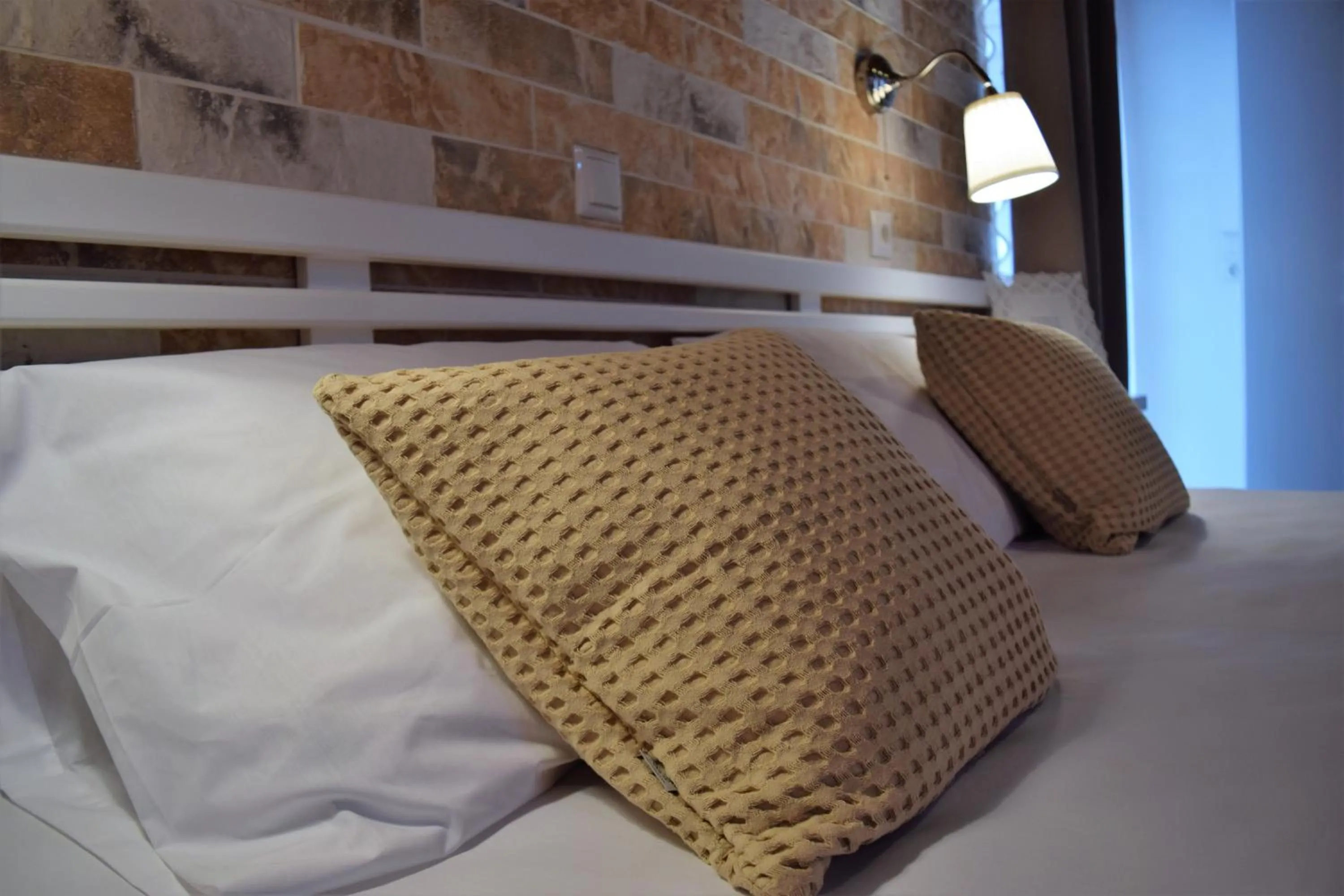 Bed in The Coast seaside rooms