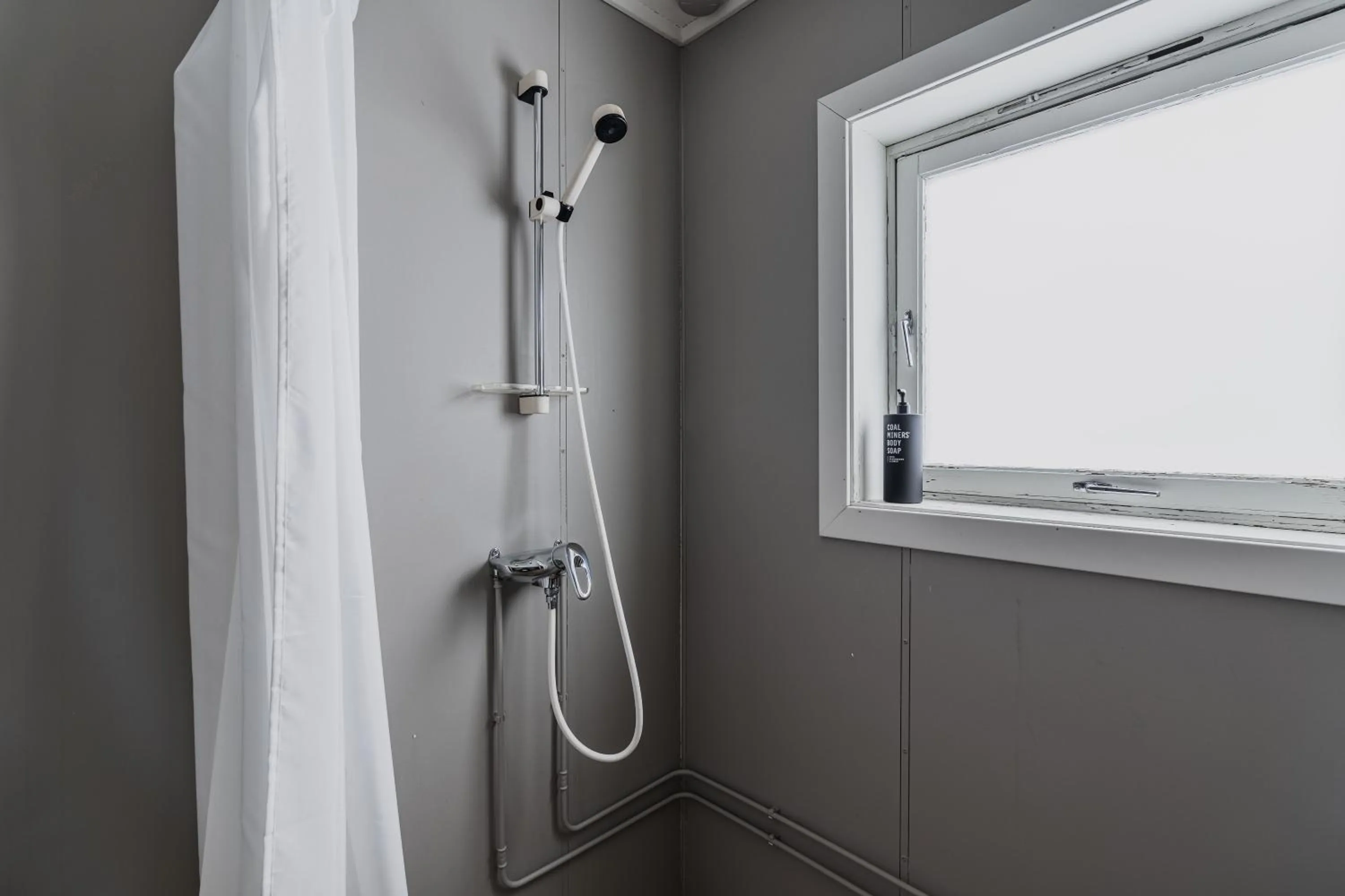 Shower in Coal Miners’ Cabins