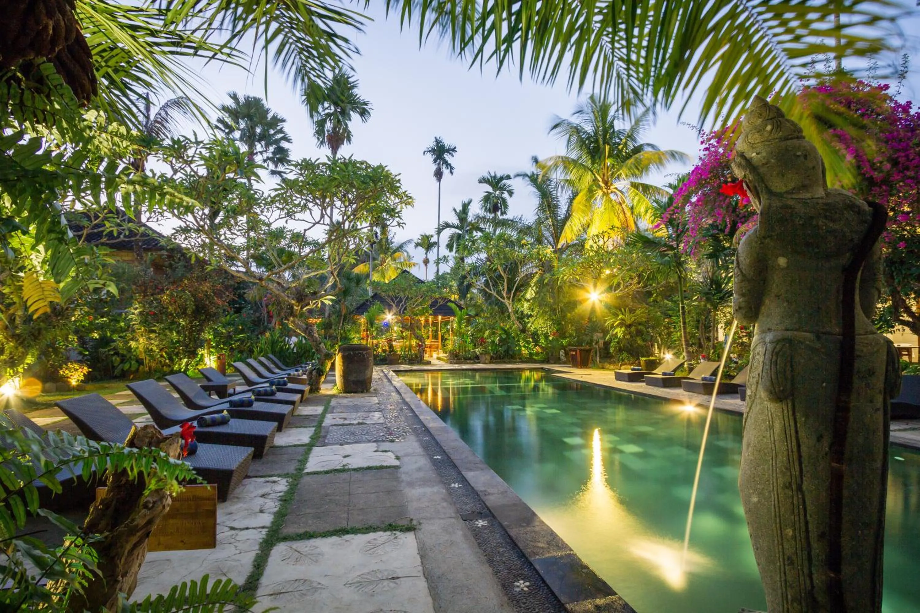 Swimming pool in Ubud Inn Cottage by Prasi