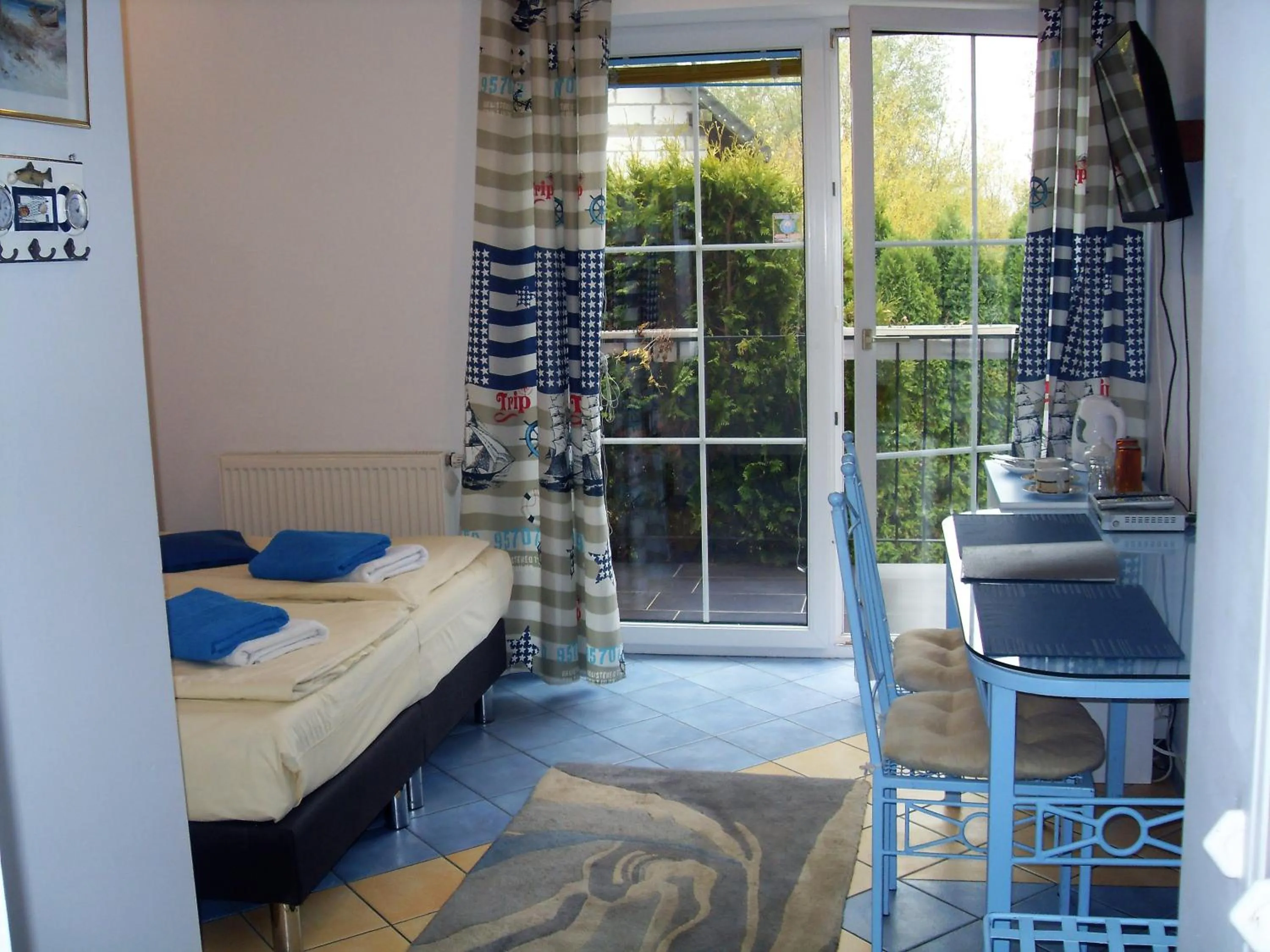 Photo of the whole room, Bed in Willa Cyklada, grill, śniadania, jezioro,przystań,tawerna-200m, park linowy-400m, centrum,aquapark-900m