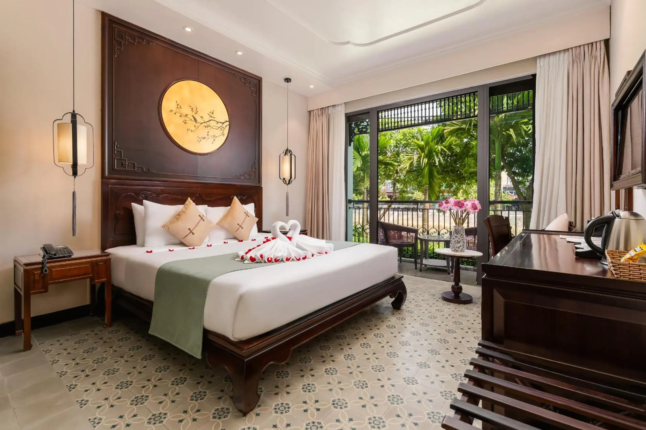 Super Deluxe Double Room with Balcony and River View in Laluna Hoi An Riverside Hotel & Spa Super Deluxe Double Room with Balcony and River View in Laluna Hoi An Riverside Hotel & Spa