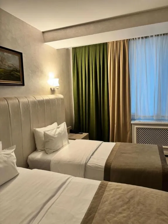 Bed in Ganjali Plaza Hotel