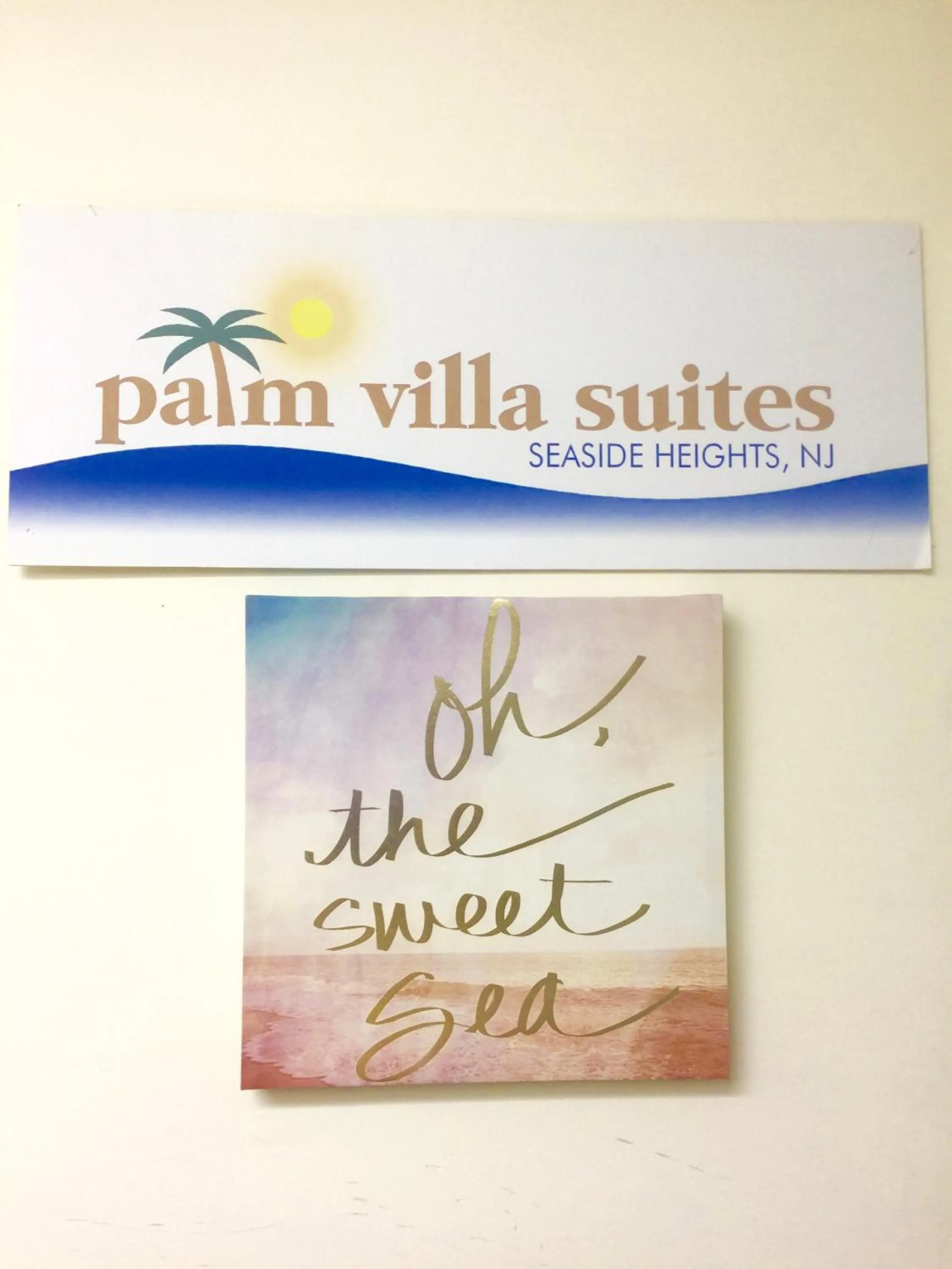 Property logo or sign in Hotel Charlee Villas Beach Hotel Oceanblock