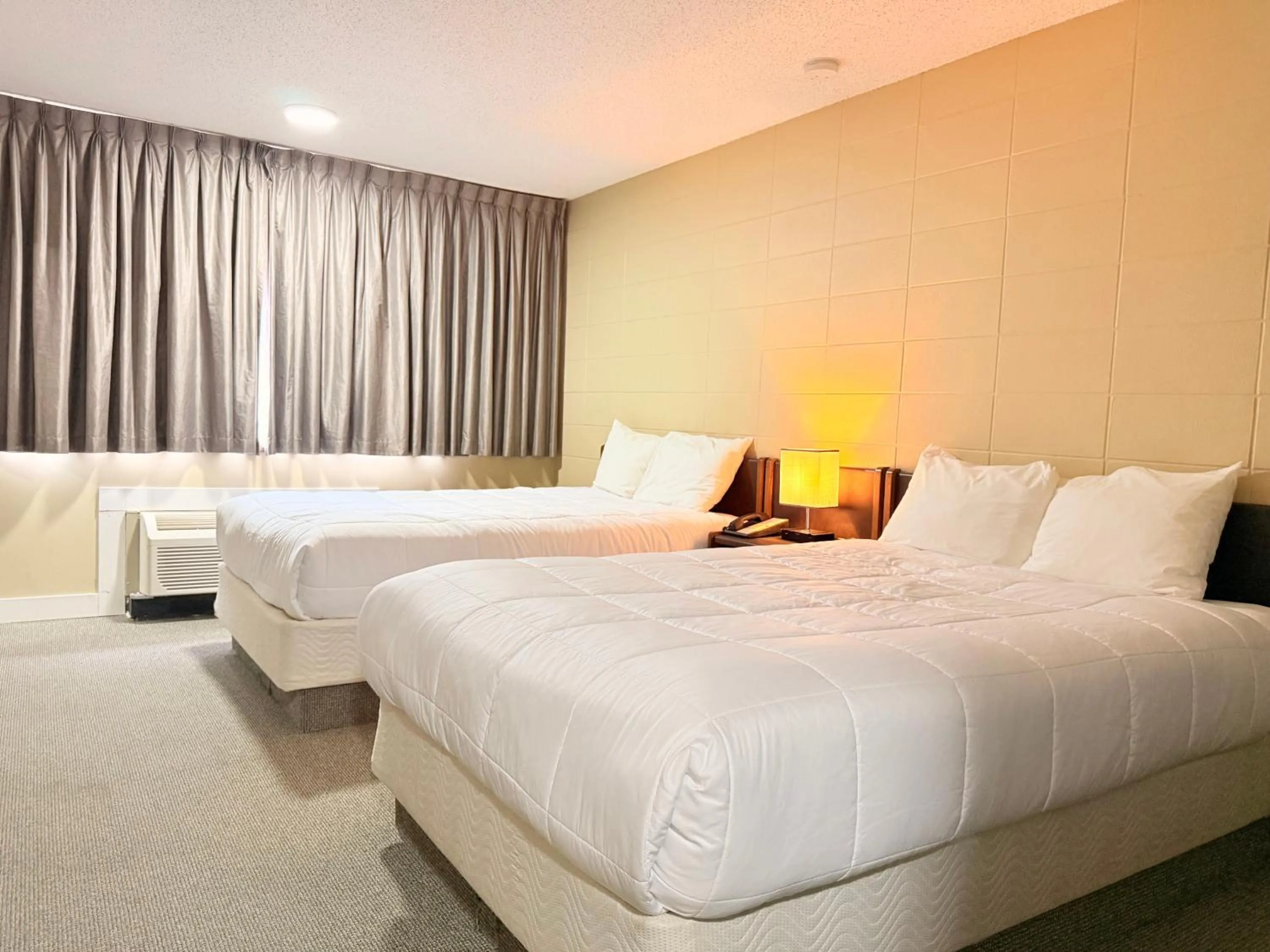 Bed in Capri Motor Inn